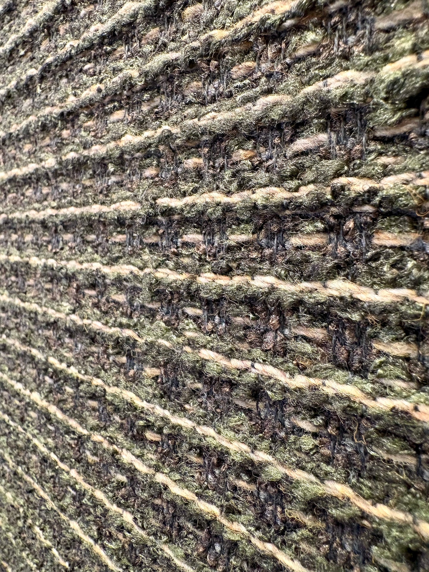 Katana Forest indoor/outdoor rug featuring deep green and light grey tones and a subtle textured pattern, power-loomed from UV-stabilised polypropylene for lasting durability. Colour forest green and light greys. 3 sizes. Close Angle.