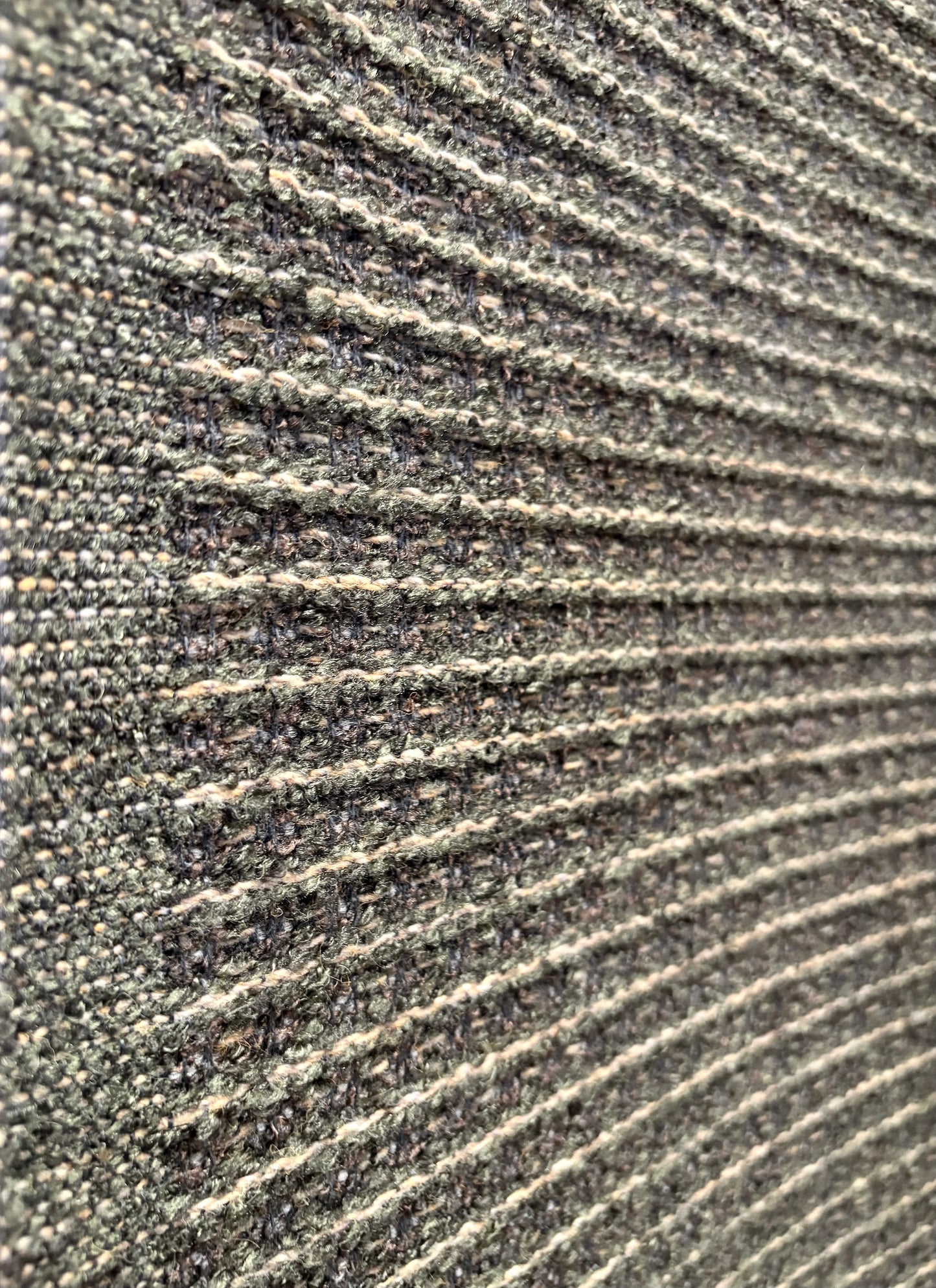 Katana Forest indoor/outdoor rug featuring deep green and light grey tones and a subtle textured pattern, power-loomed from UV-stabilised polypropylene for lasting durability. Colour forest green and light greys. 3 sizes. Side.