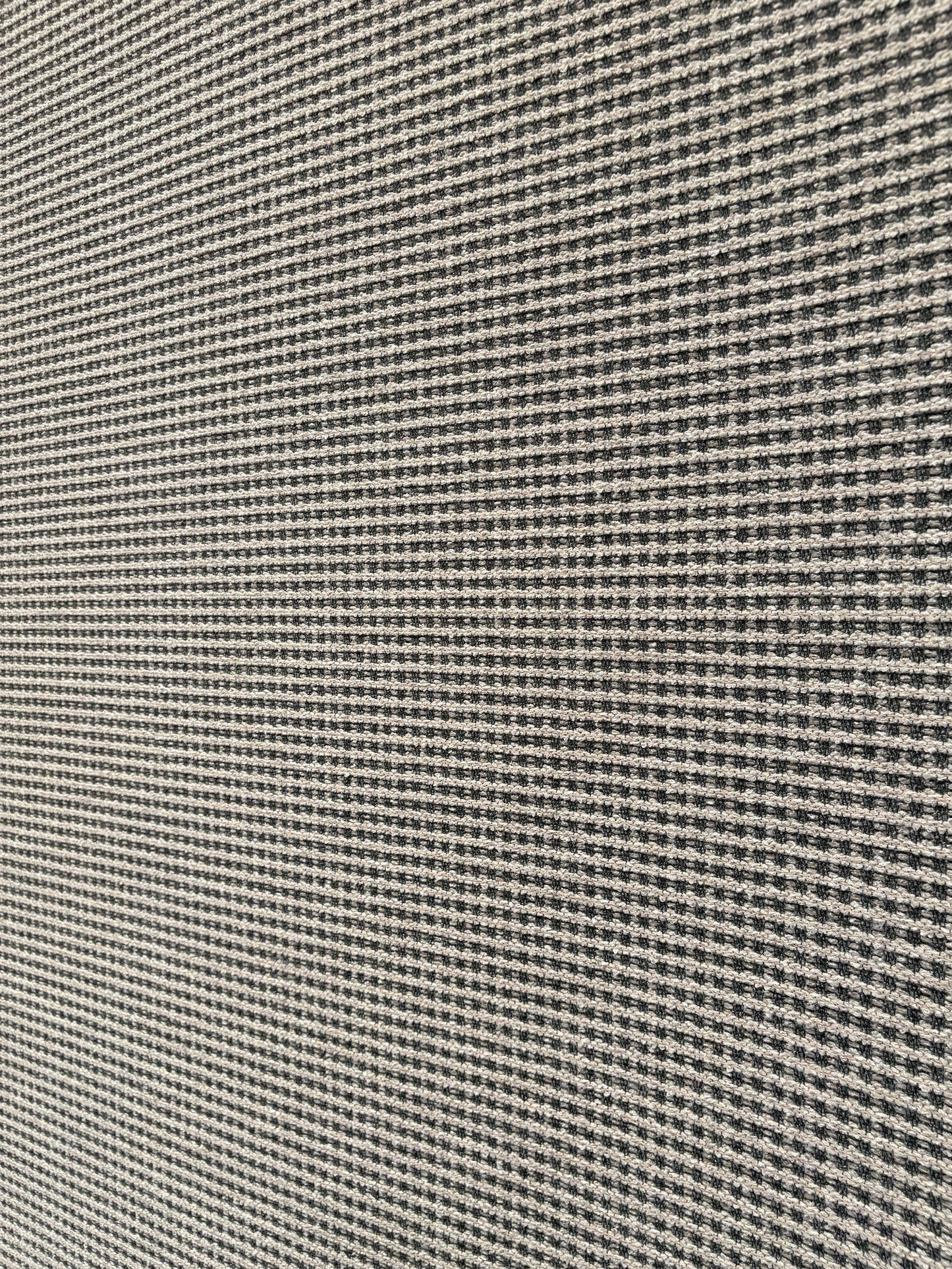 Katana Light Grey indoor/outdoor rug featuring light grey/grey tones and a subtle textured pattern, power-loomed from UV-stabilised polypropylene for lasting durability. Colour light grey. 3 sizes. Angle 1.
