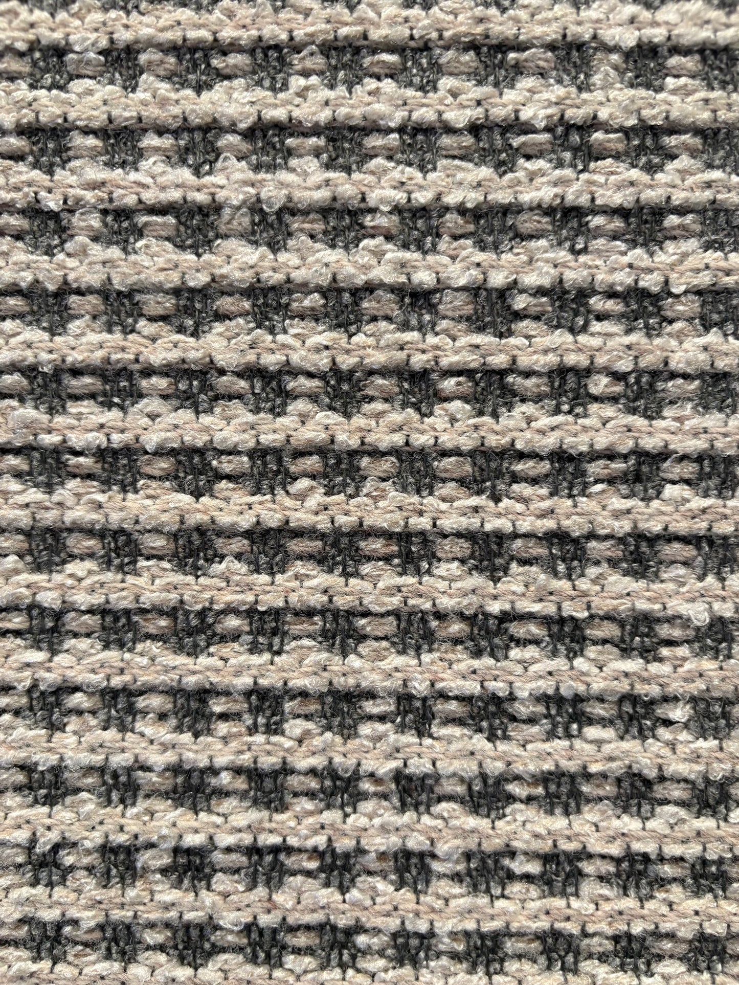 Katana Light Grey indoor/outdoor rug featuring light grey/grey tones and a subtle textured pattern, power-loomed from UV-stabilised polypropylene for lasting durability. Colour light grey. 3 sizes. Close.