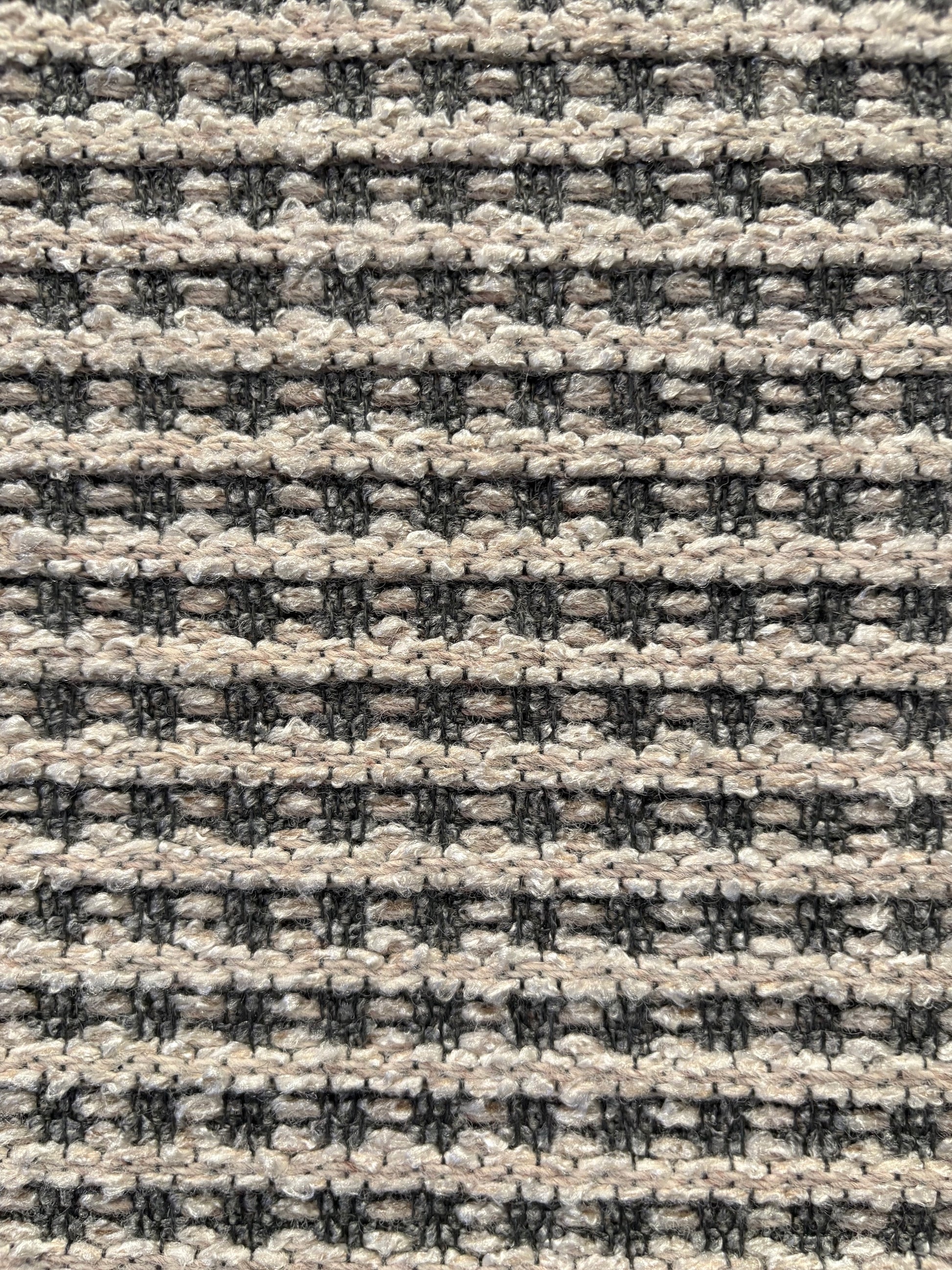 Katana Light Grey indoor/outdoor rug featuring light grey/grey tones and a subtle textured pattern, power-loomed from UV-stabilised polypropylene for lasting durability. Colour light grey. 3 sizes. Close.