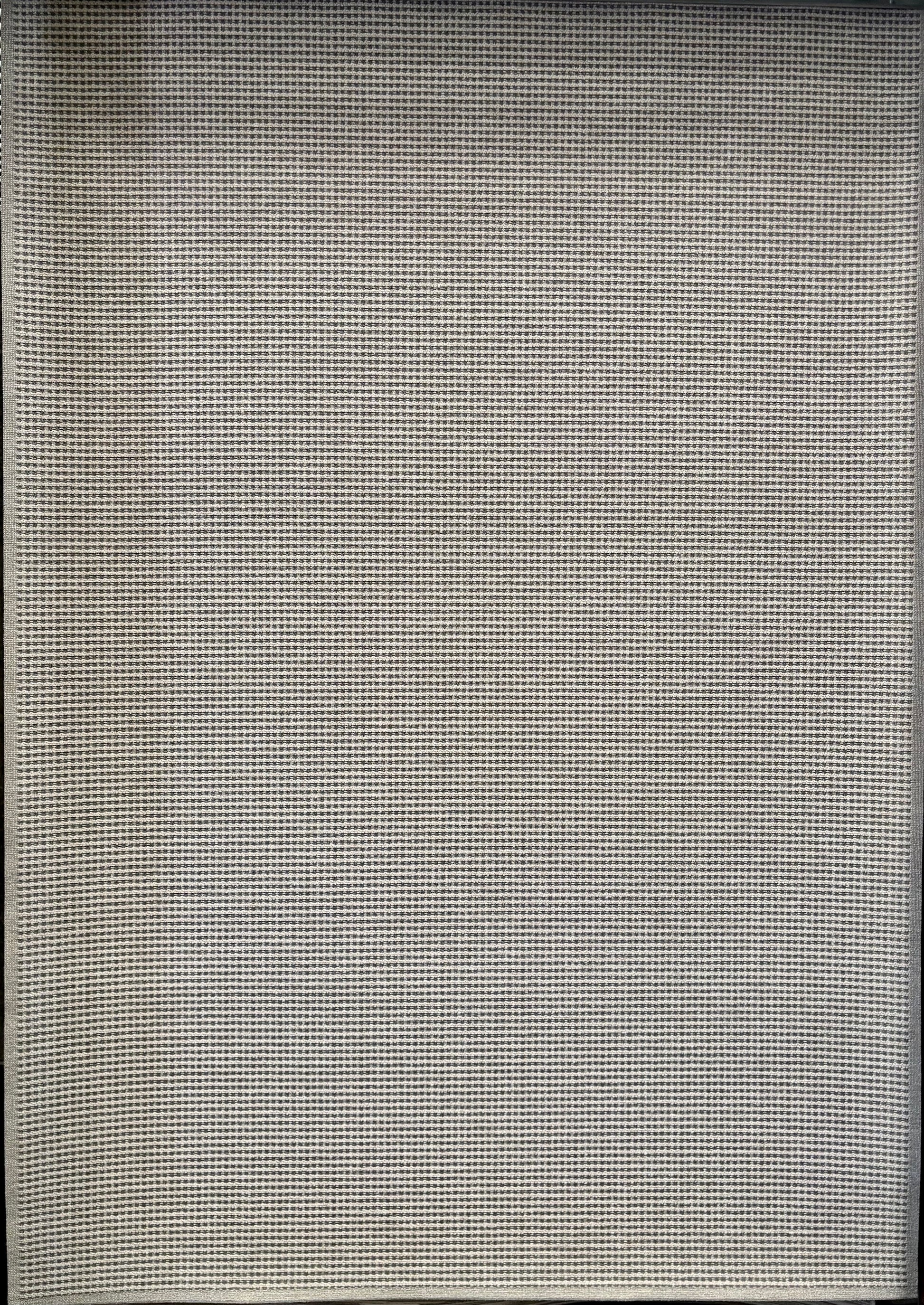 Katana Light Grey indoor/outdoor rug featuring light grey/grey tones and a subtle textured pattern, power-loomed from UV-stabilised polypropylene for lasting durability. Colour light grey. 3 sizes. Full.
