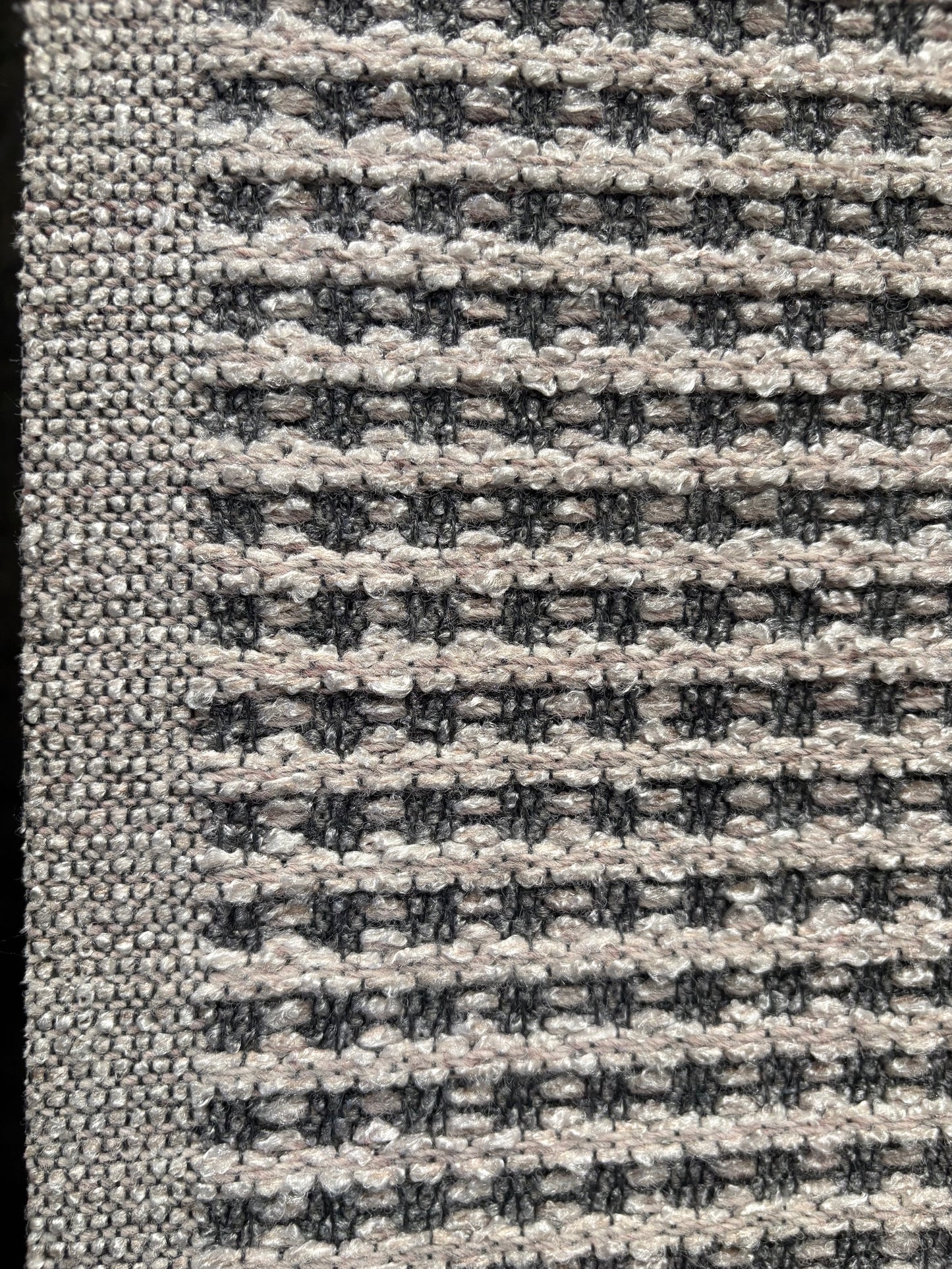 Katana Light Grey indoor/outdoor rug featuring light grey/grey tones and a subtle textured pattern, power-loomed from UV-stabilised polypropylene for lasting durability. Colour light grey. 3 sizes. Side.