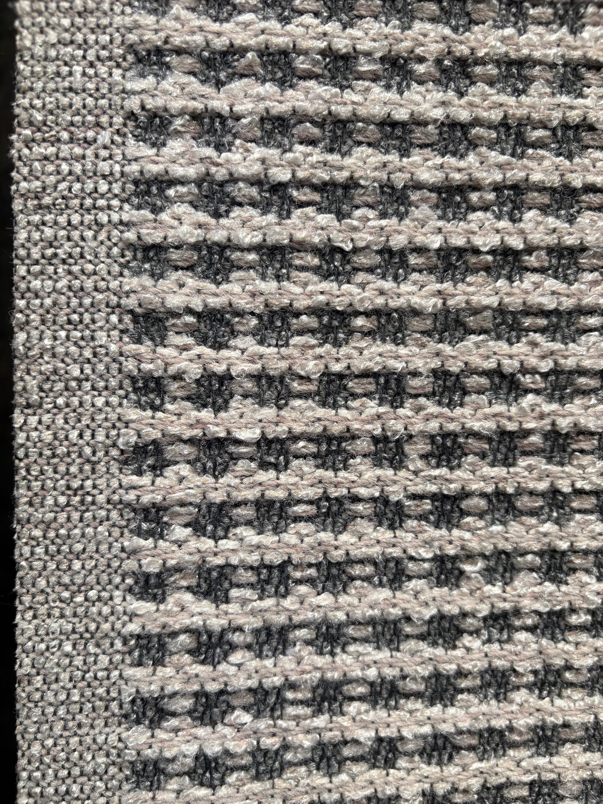 Katana Light Grey indoor/outdoor rug featuring light grey/grey tones and a subtle textured pattern, power-loomed from UV-stabilised polypropylene for lasting durability. Colour light grey. 3 sizes. Side.