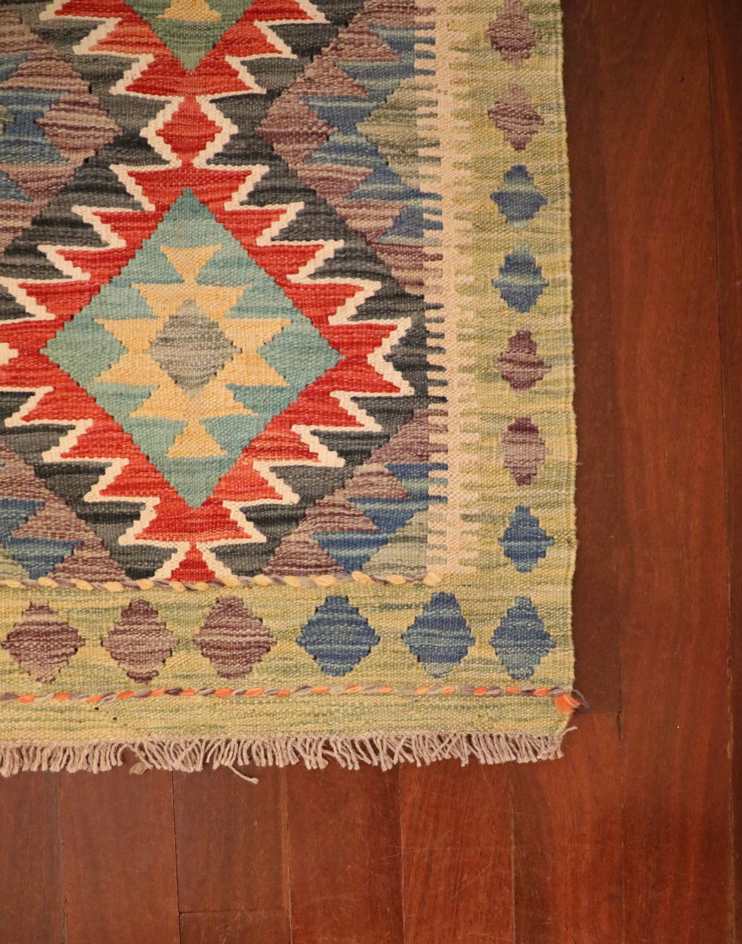  The Afghan Hand Woven Khyber Kilim - 59 X 90. Crafted using traditional vegetable dyed wool, and featuring traditional geometric designs. Colours, beiges, blues, creams, light greens, light blues and yellows. Size 59 X 90. Corner.