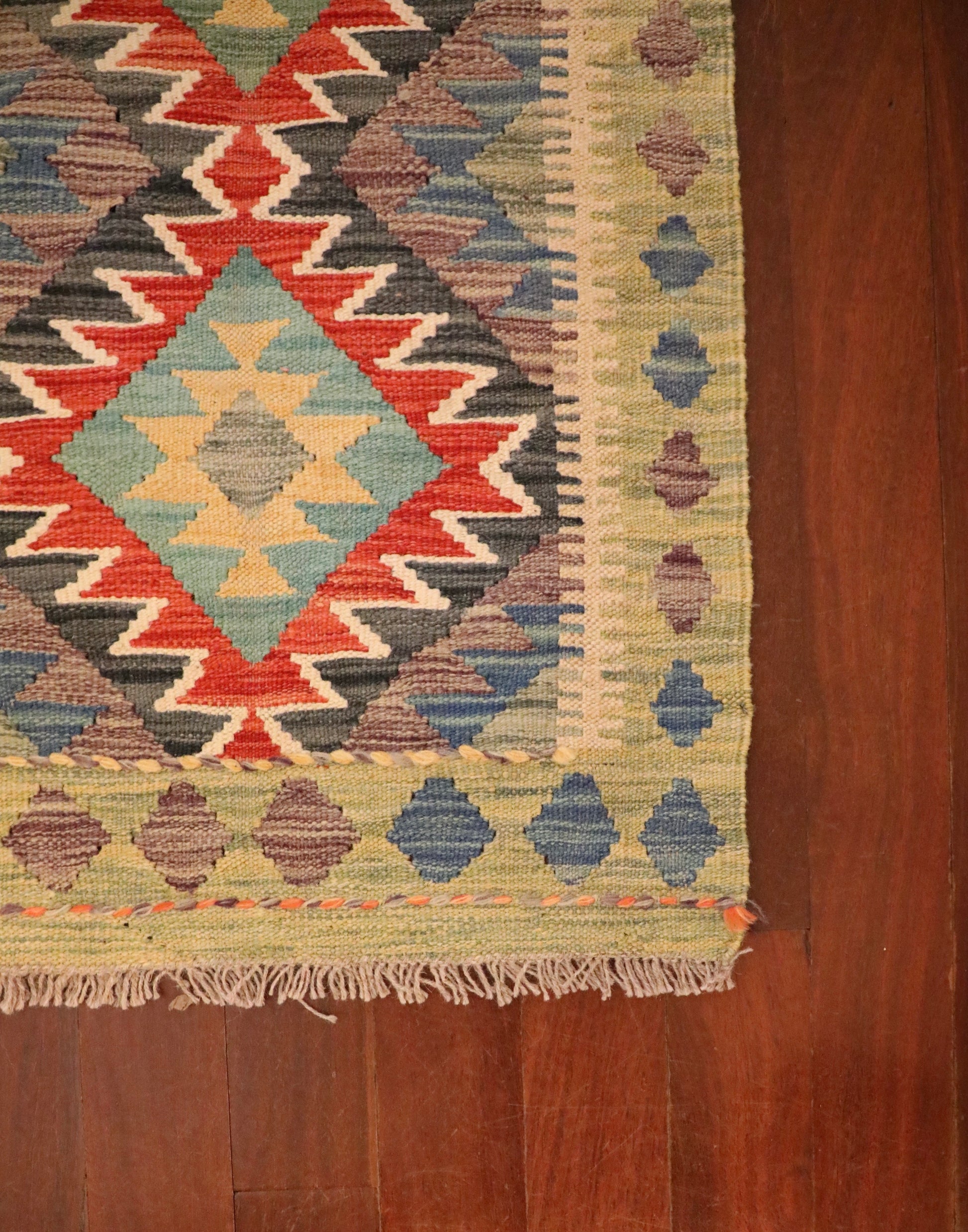  The Afghan Hand Woven Khyber Kilim - 59 X 90. Crafted using traditional vegetable dyed wool, and featuring traditional geometric designs. Colours, beiges, blues, creams, light greens, light blues and yellows. Size 59 X 90. Corner.