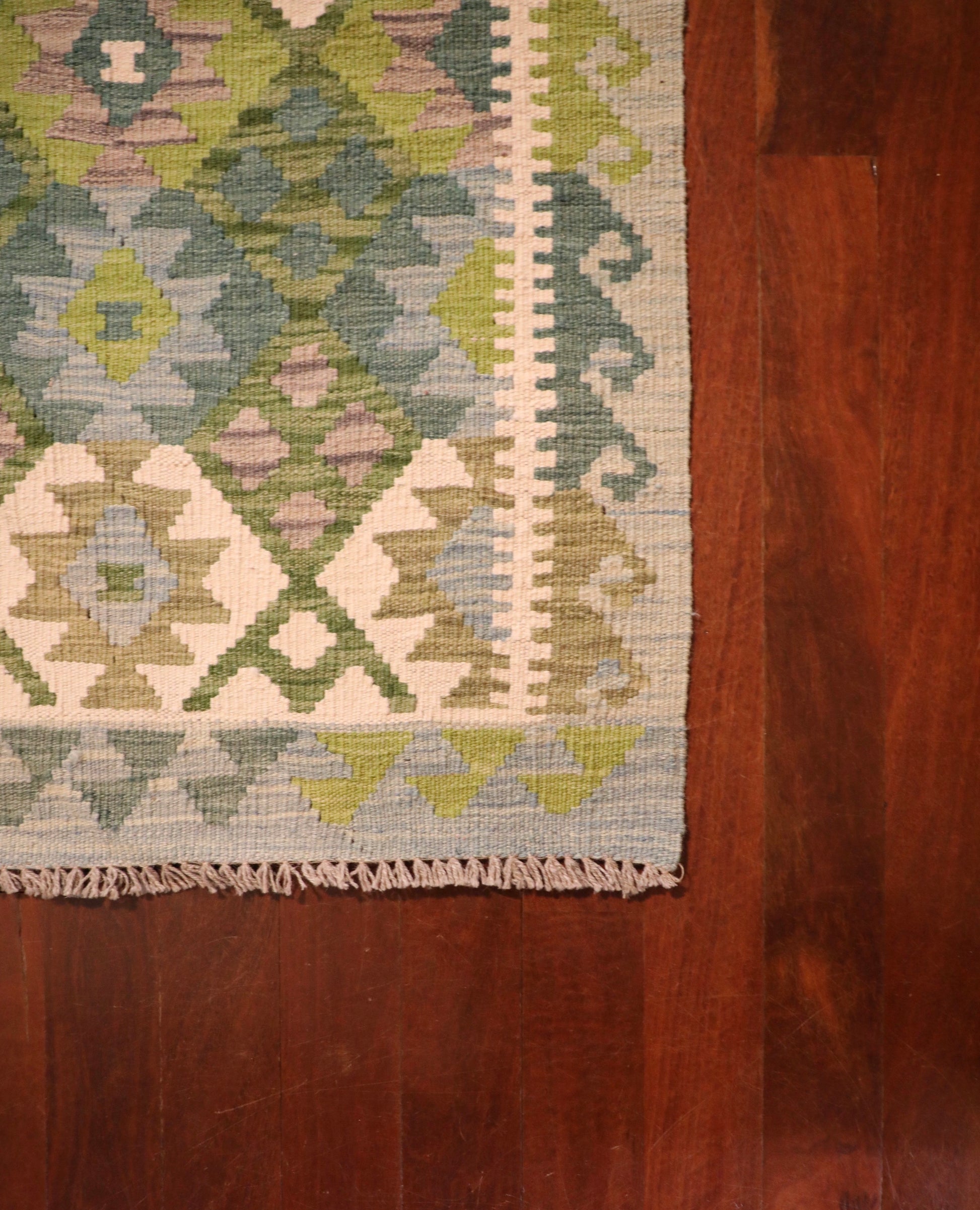Khyber Kilim Rug Runner 82 X 312.  Hand woven wool with vegetable dyes.  Colours greens, greys and creams. Measures 82 wide x 312 length. Corner.