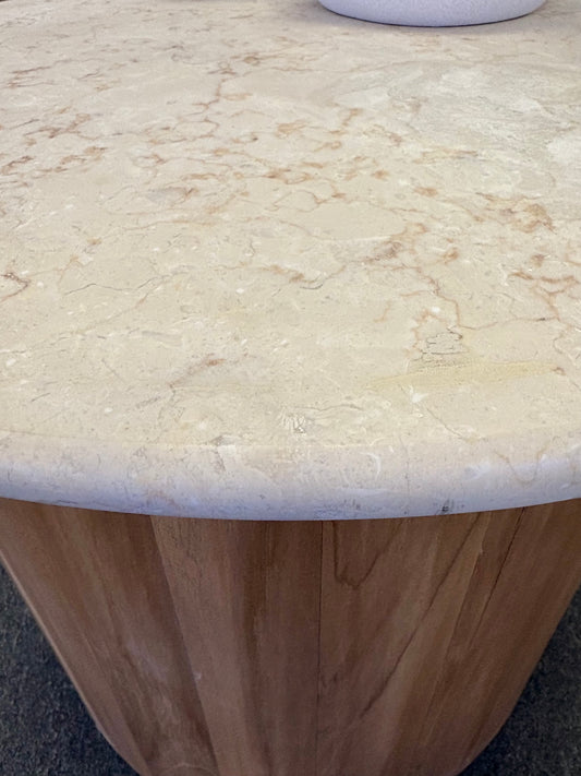 The Kobe Marble Top Side Table with a smooth round marble top and cylindrical teak wood base. Measures 600 diameter x 500 height. Top Close.