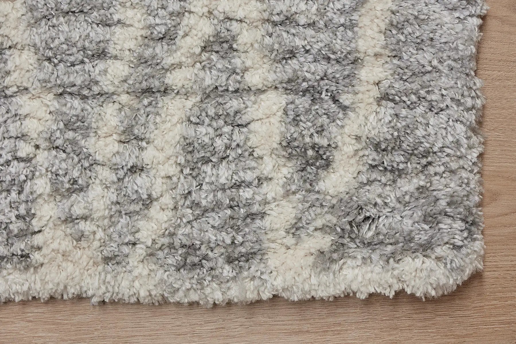 Konya Grey is a Moroccan/Boho inspiration rug.  Machine made of Polyester, this shaggy style rugs brings added soften textures.  Colours Grey, White and Light Grey. Sizes 160 X 230, 200 X 290, 240 X 340 and 300 X 400. Corner.