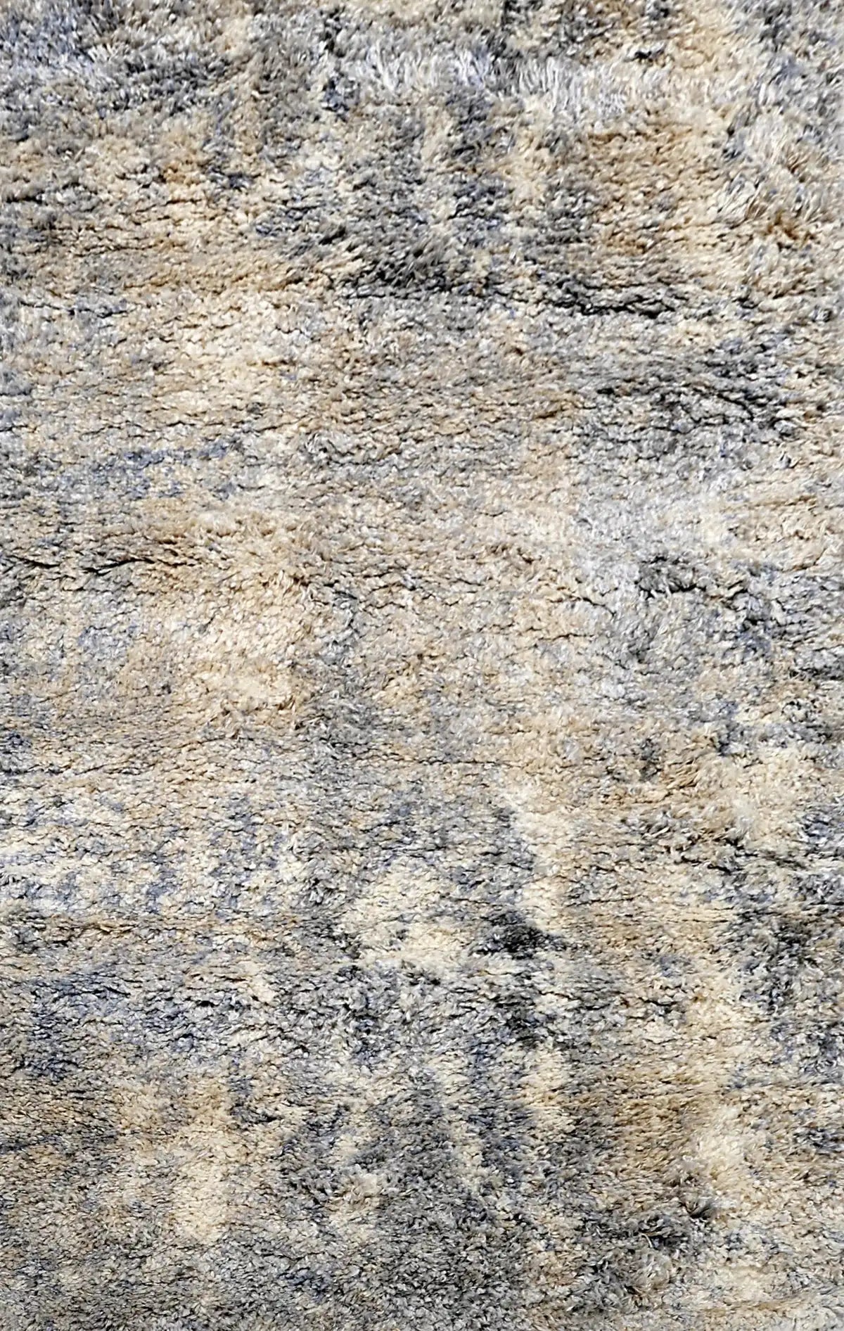 Konya Ice is a Moroccan/Boho inspiration rug.  Machine made of Polyester, this shaggy style rugs brings added soften textures.  Colours Grey, White, Beige and Light Grey. Sizes 160 X 230, 200 X 290, 240 X 340 and 300 X 400. Full.