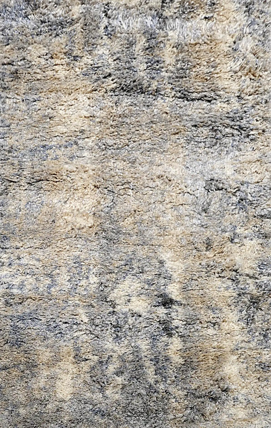 Konya Ice is a Moroccan/Boho inspiration rug.  Machine made of Polyester, this shaggy style rugs brings added soften textures.  Colours Grey, White, Beige and Light Grey. Sizes 160 X 230, 200 X 290, 240 X 340 and 300 X 400. Full.
