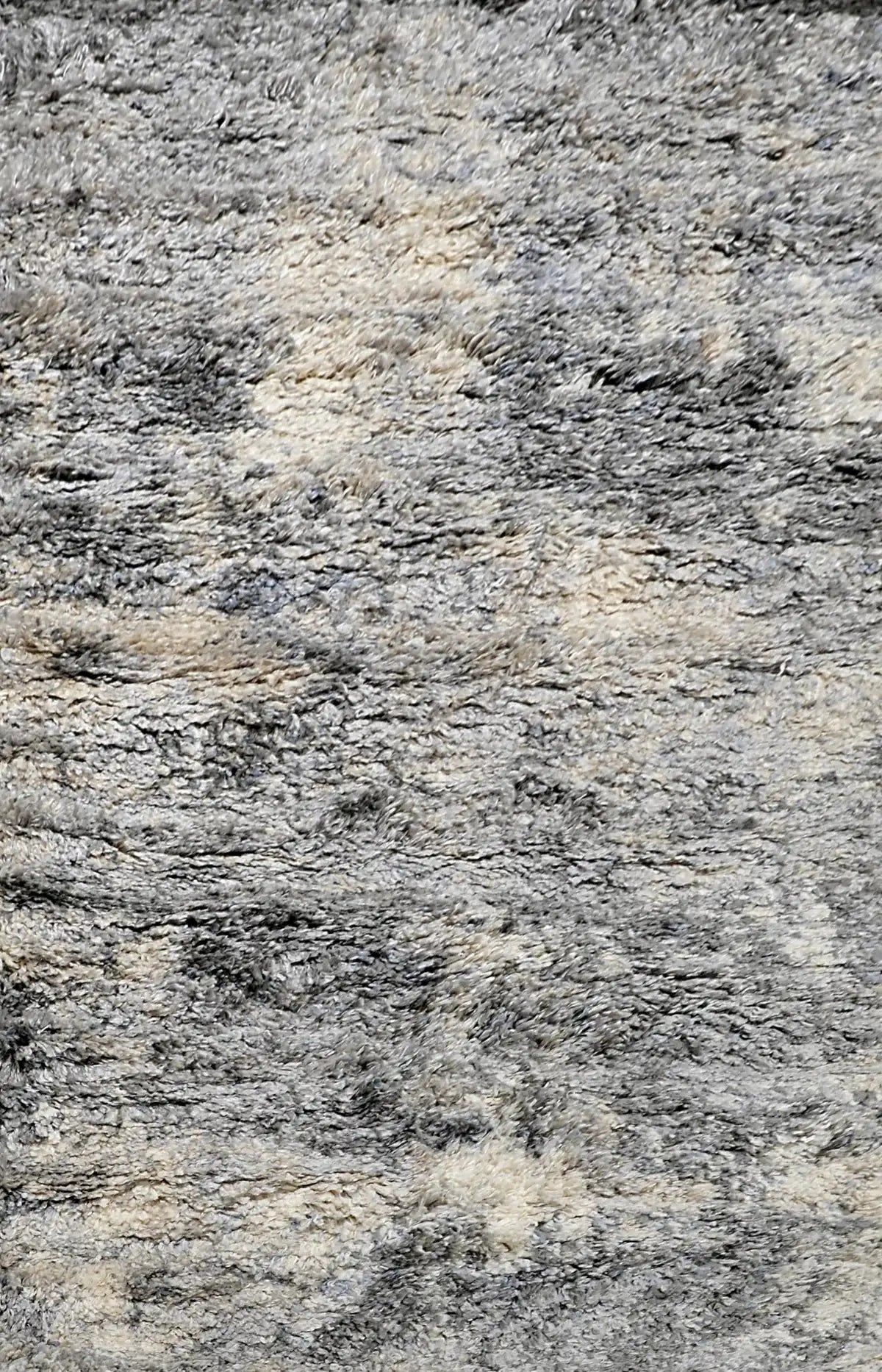 Konya Sand is a Moroccan/Boho inspiration rug.  Machine made of Polyester, this shaggy style rugs brings added soften textures.  Colours Grey, White, Beige and Light Grey. Sizes 160 X 230, 200 X 290, 240 X 340 and 300 X 400. Full.