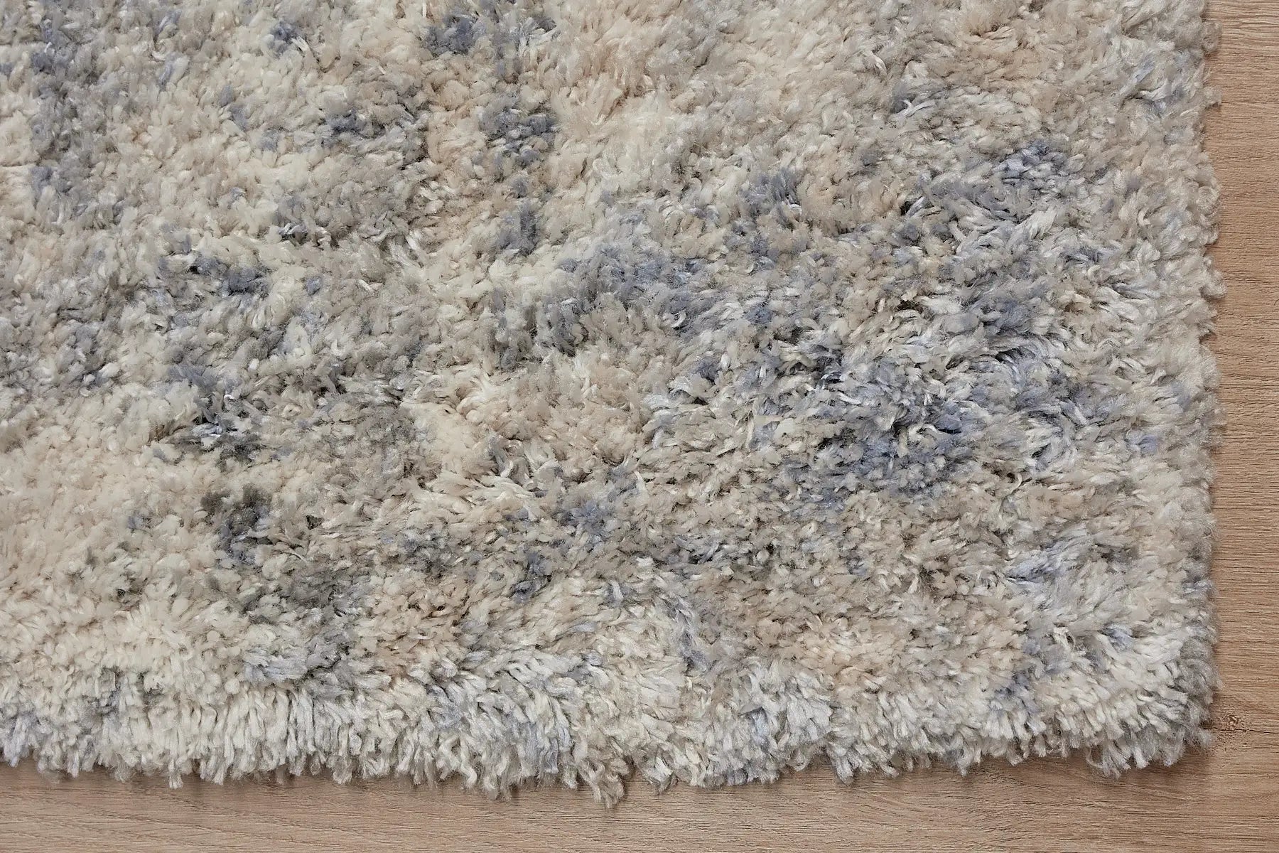 Konya Taupe is a Moroccan/Boho inspiration rug.  Machine made of Polyester, this shaggy style rugs brings added soften textures.  Colours Grey, White, and Light Grey. Sizes 160 X 230, 200 X 290, 240 X 340 and 300 X 400. Corner.