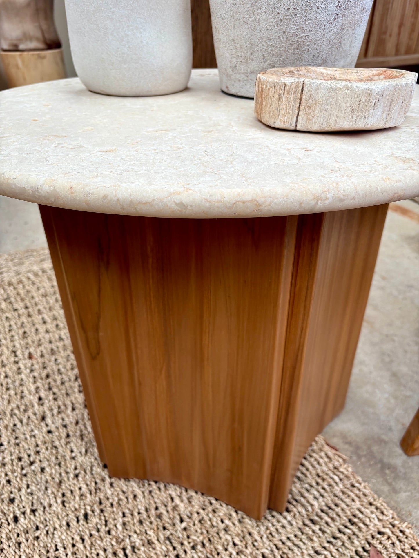 The Kyoto Marble Top Side Table with a smooth round marble top and 5 sided teak wood base. Measures 600 diameter x 500 height. Close.