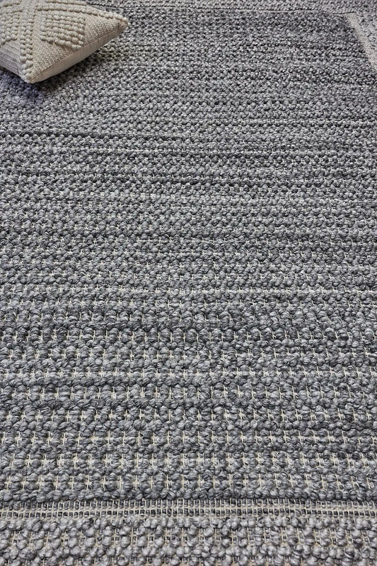 Liberty Ash is an eco-luxury rug crafted with hand woven recycled PET (plastic bottles) yarn. Boasting a super soft textured loop pile and pile height of 16-18mm. Colour Grey and Light Grey. Sizes 160 X 230, 200 X 290, 240 X 340 and 290 X 390. Life.