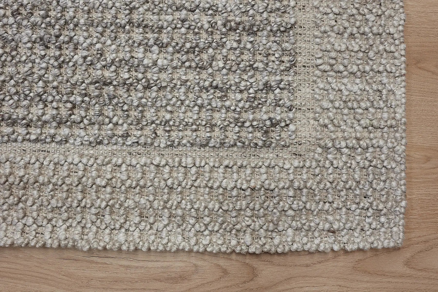 Liberty Walnut is an eco-luxury rug crafted with hand woven recycled PET (plastic bottles) yarn. Boasting a super soft textured loop pile and pile height of 16-18mm. Colour Cream and Beige/Brown. Sizes 160 X 230, 200 X 290, 240 X 340 and 290 X 390. Corner.