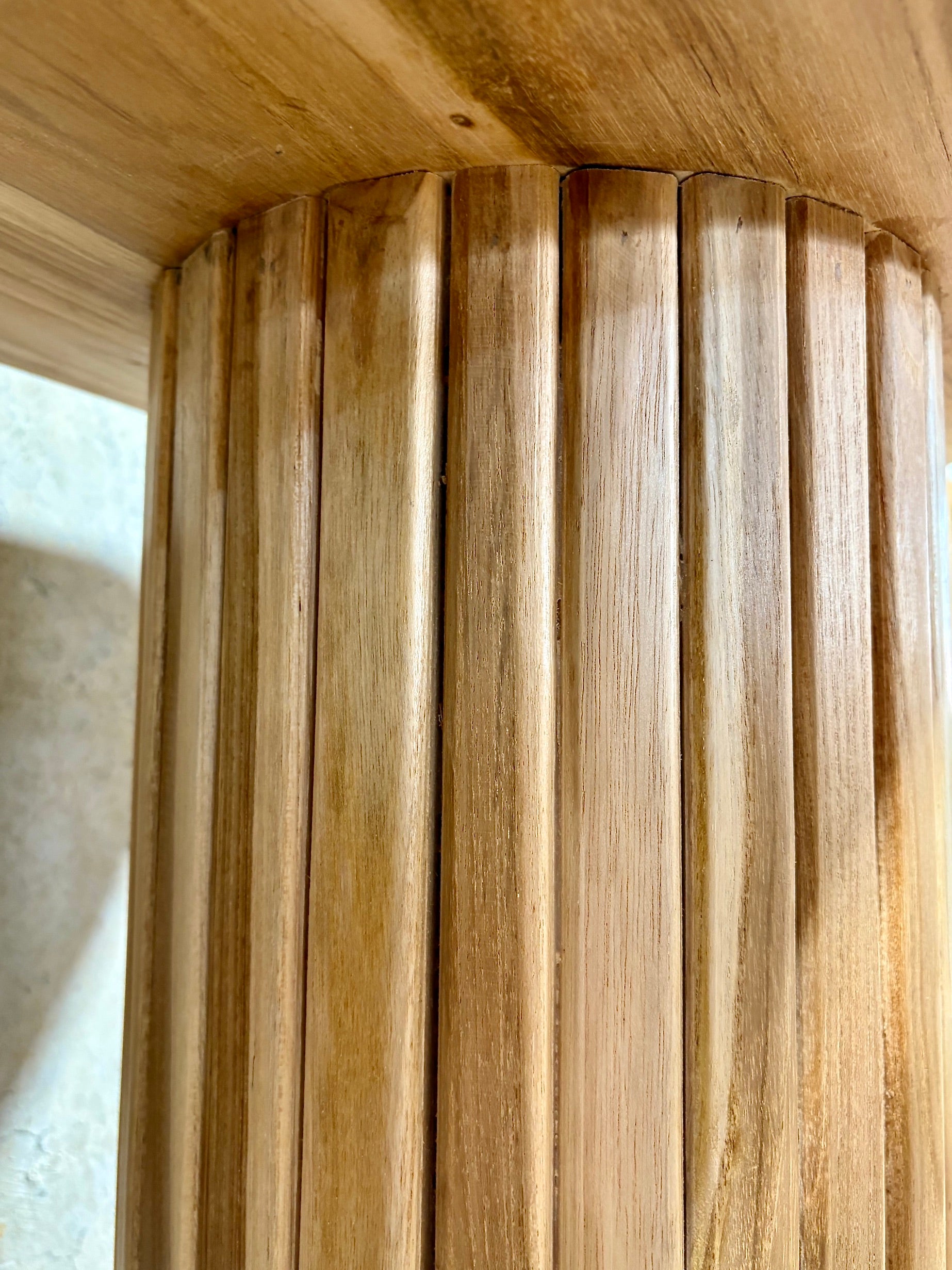 Lisbon console crafted from solid teak featuring textured cylindrical legs and solid top with rounded ends. Colour Natural Teak. Measures 1200 Wide X 350 Depth X 800 Height. Under.