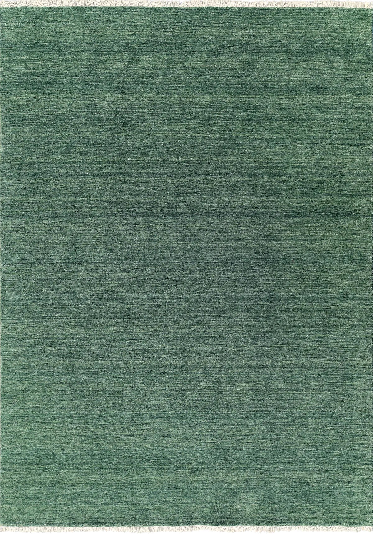 Lori Green is a luxurious hand loomed floor rug made of 100% wool. The wool material creates a soft texture and a smooth pile height of 16-18mm. Colour forrest green with cream tassels. Sizes 160 X 230, 200 X 290, 240 X 340 and 300 X 400. Top view.