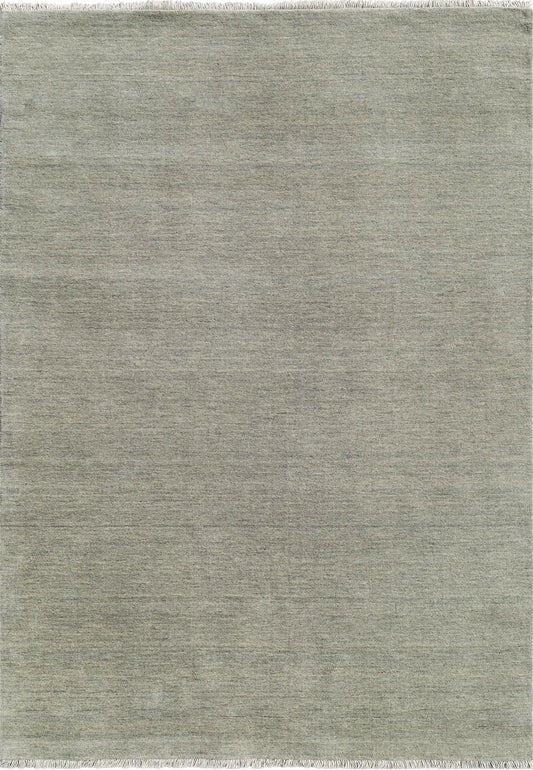 Lori Light Grey is a luxurious hand loomed floor rug made of 100% wool. The wool material creates a soft texture and a smooth pile height of 16-18mm. Colour Light Grey with cream tassels. Sizes 160 X 230, 200 X 290, 240 X 340 and 300 X 400. Top view.