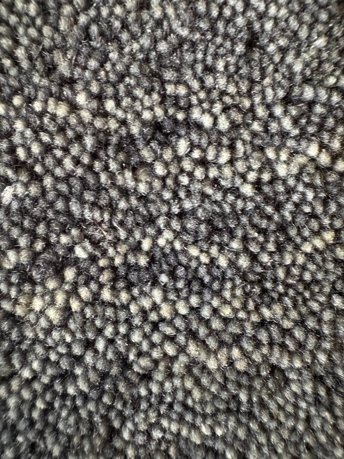 Lori Smoke is a luxurious hand loomed floor rug made of 100% wool. The wool material creates a soft texture and a smooth pile height of 16-18mm. Colour dark smokey Grey with cream tassels. Sizes 160 X 230, 200 X 290, 240 X 340 and 300 X 400. Close.