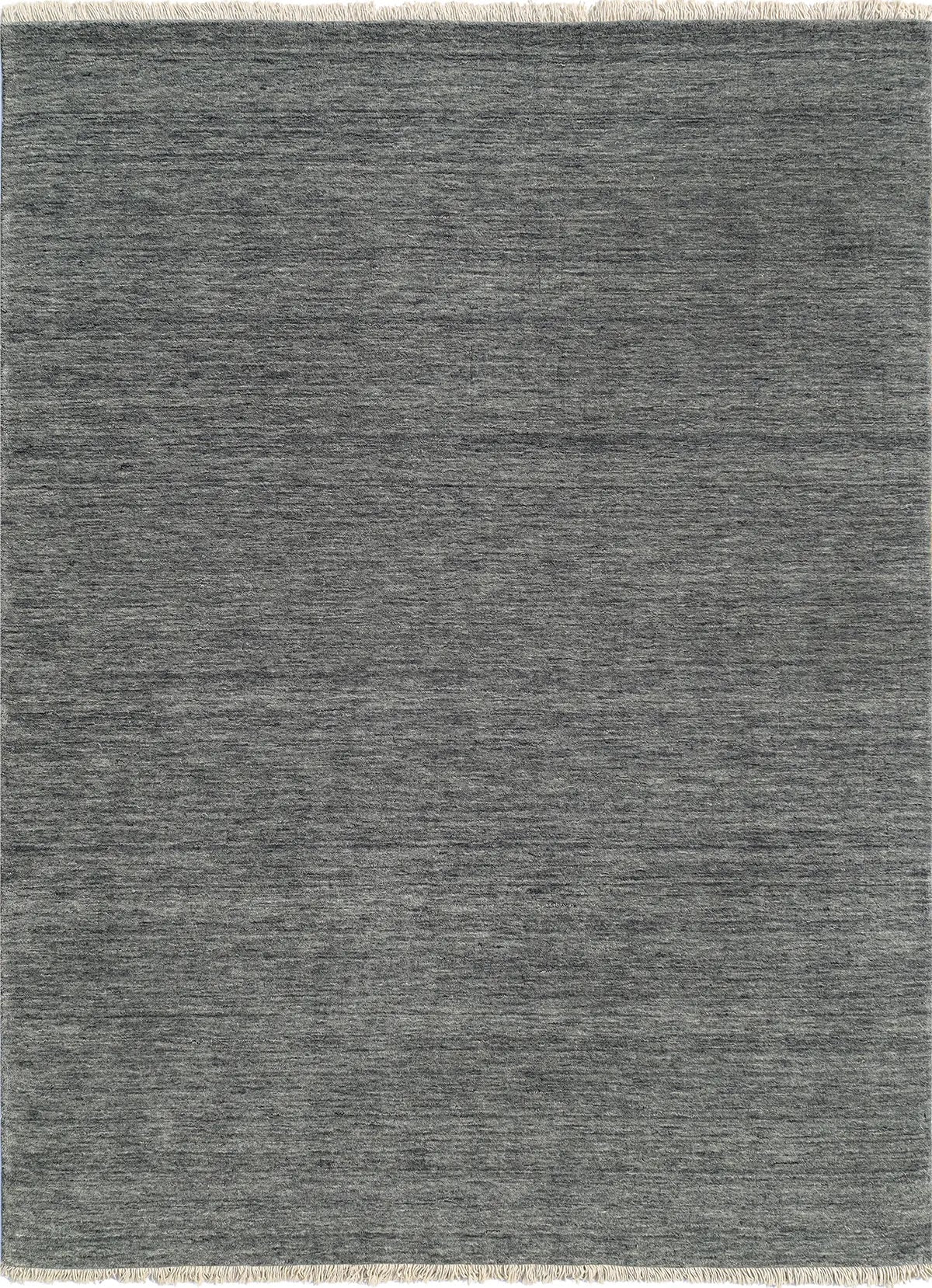 Lori Smoke is a luxurious hand loomed floor rug made of 100% wool. The wool material creates a soft texture and a smooth pile height of 16-18mm. Colour dark smokey Grey with cream tassels. Sizes 160 X 230, 200 X 290, 240 X 340 and 300 X 400. Top view.