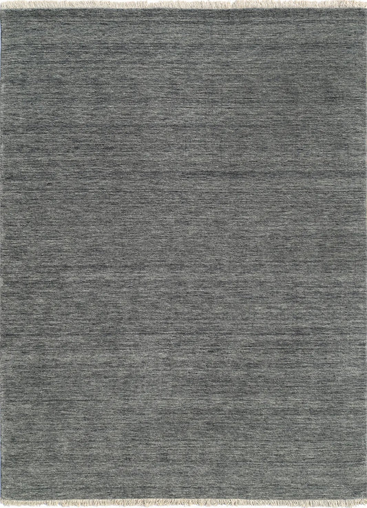 Lori Smoke is a luxurious hand loomed floor rug made of 100% wool. The wool material creates a soft texture and a smooth pile height of 16-18mm. Colour dark smokey Grey with cream tassels. Sizes 160 X 230, 200 X 290, 240 X 340 and 300 X 400. Top view.