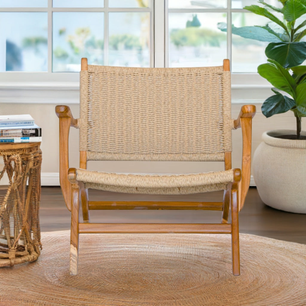 The Lotus Occasional Chair. Made with sustainable teak and natural rope, this occasional chair exudes style while providing comfort and durability. Measures 720 Depth X 730 Height - 350 Seat Height. Life.