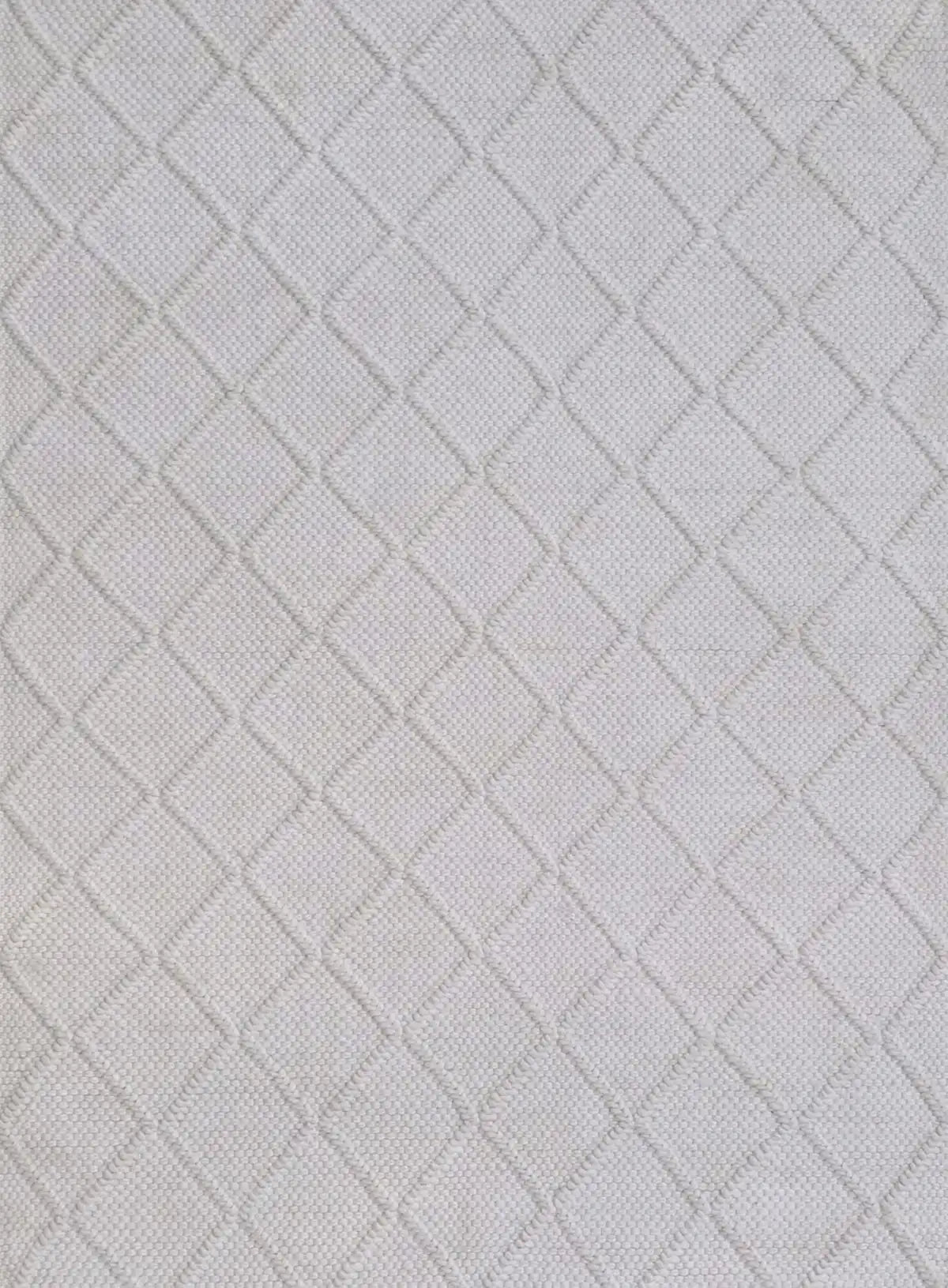 Lounge White is a luxurious wool and bamboo silk rug, featuring a modern Scandinavian Diamond Pattern design and textured hand loomed pile. With pile height of 16-18mm. Colour White with white diamond pattern. Sizes 160 X 230, 200 X 290 and 240 X 340. Full.