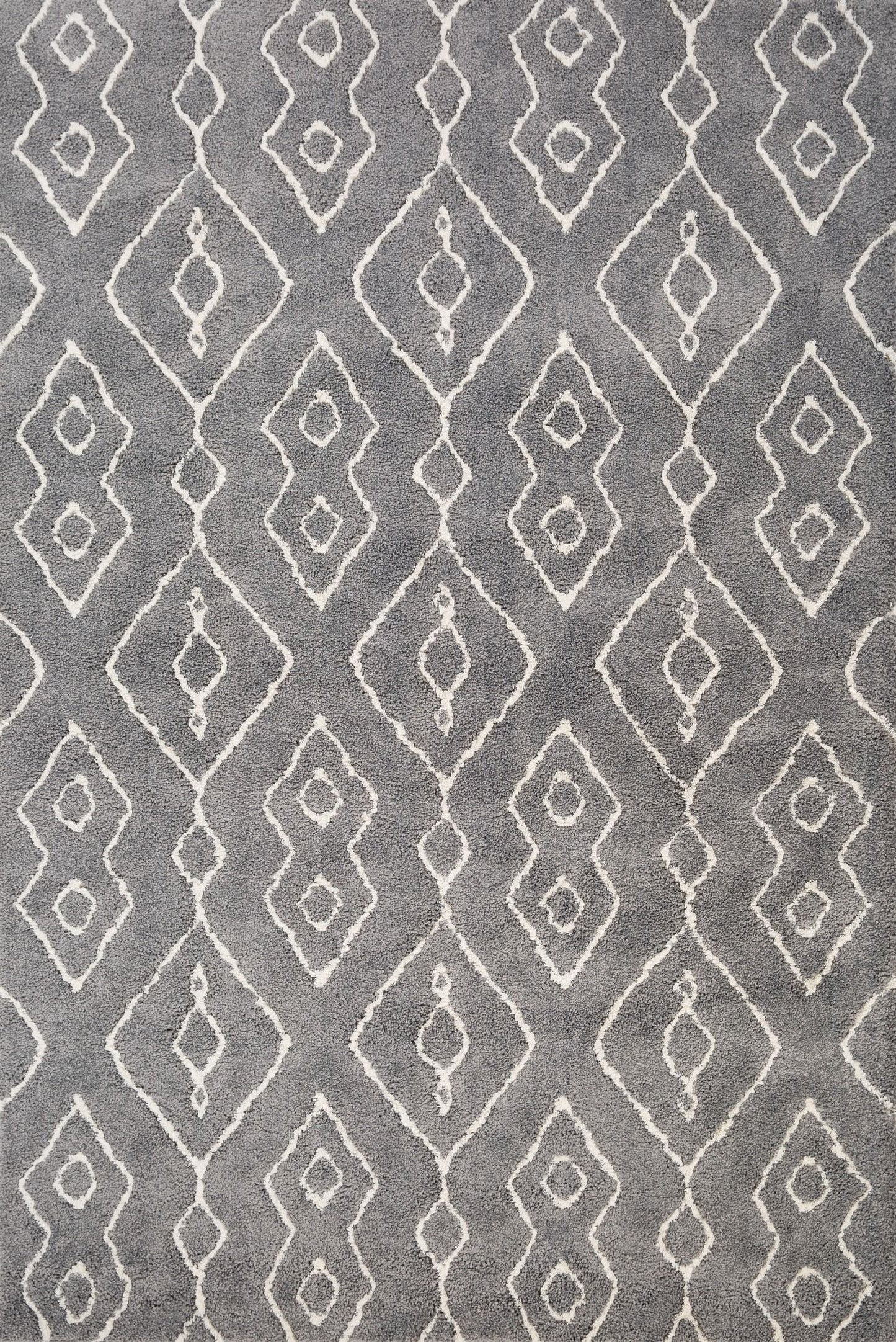 Luana Grey Ivory 8020 is a machine made polypropylene rug.  It features a shaggy pile with a moroccan boho inspired design. Colours Grey with Ivory White moroccan inspired patterns. Sizes 160 X 230, 200 X 290, 240 X 320 and 300 X 390. Full.