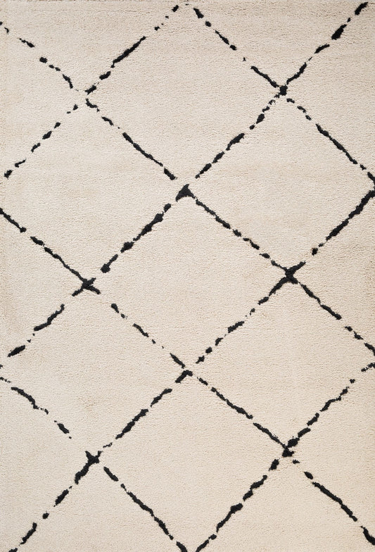 Luana Ivory Charcoal 4155 is a machine made polypropylene rug.  It features a shaggy pile with a moroccan boho inspired design. Colours Ivory with a charcoal diamond pattern. Sizes 160 X 230, 200 X 290, 240 X 320 and 300 X 390. Full.