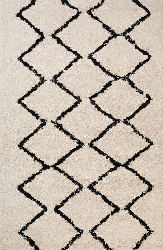 Luana Ivory Charcoal 701 is a machine made polypropylene rug.  It features a shaggy pile with a moroccan boho inspired design. Colours Ivory with a charcoal diamond pattern. Sizes 160 X 230, 200 X 290, 240 X 320 and 300 X 390. Full.