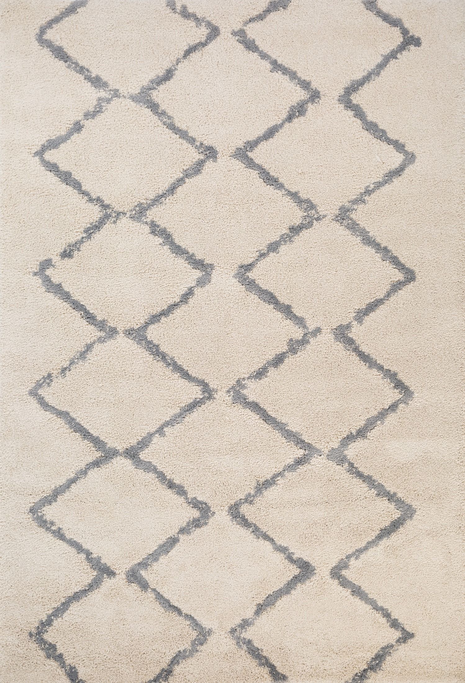 Luana Ivory Grey 701 is a machine made polypropylene rug.  It features a shaggy pile with a moroccan boho inspired design. Colours Ivory with a grey diamond pattern. Sizes 160 X 230, 200 X 290, 240 X 320 and 300 X 390. Full.