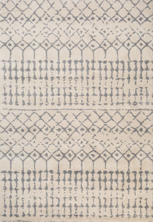 Luana Ivory Grey 71 is a machine made polypropylene rug.  It features a shaggy pile with a moroccan boho inspired design. Colours Ivory with grey moroccan inspired patterns. Sizes 160 X 230, 200 X 290, 240 X 320 and 300 X 390. Full.