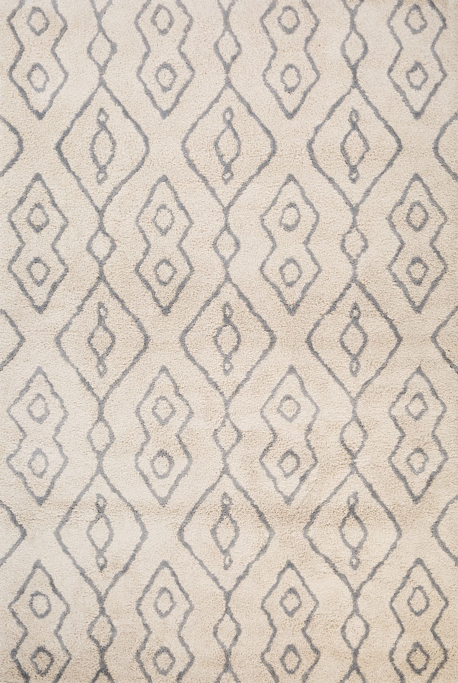Luana Column Ivory Grey is a machine made polypropylene rug.  It features a shaggy pile with a moroccan boho inspired design. Colours Ivory with grey moroccan inspired diamond patterns. Sizes 160 X 230, 200 X 290, 240 X 320 and 300 X 390. Top.