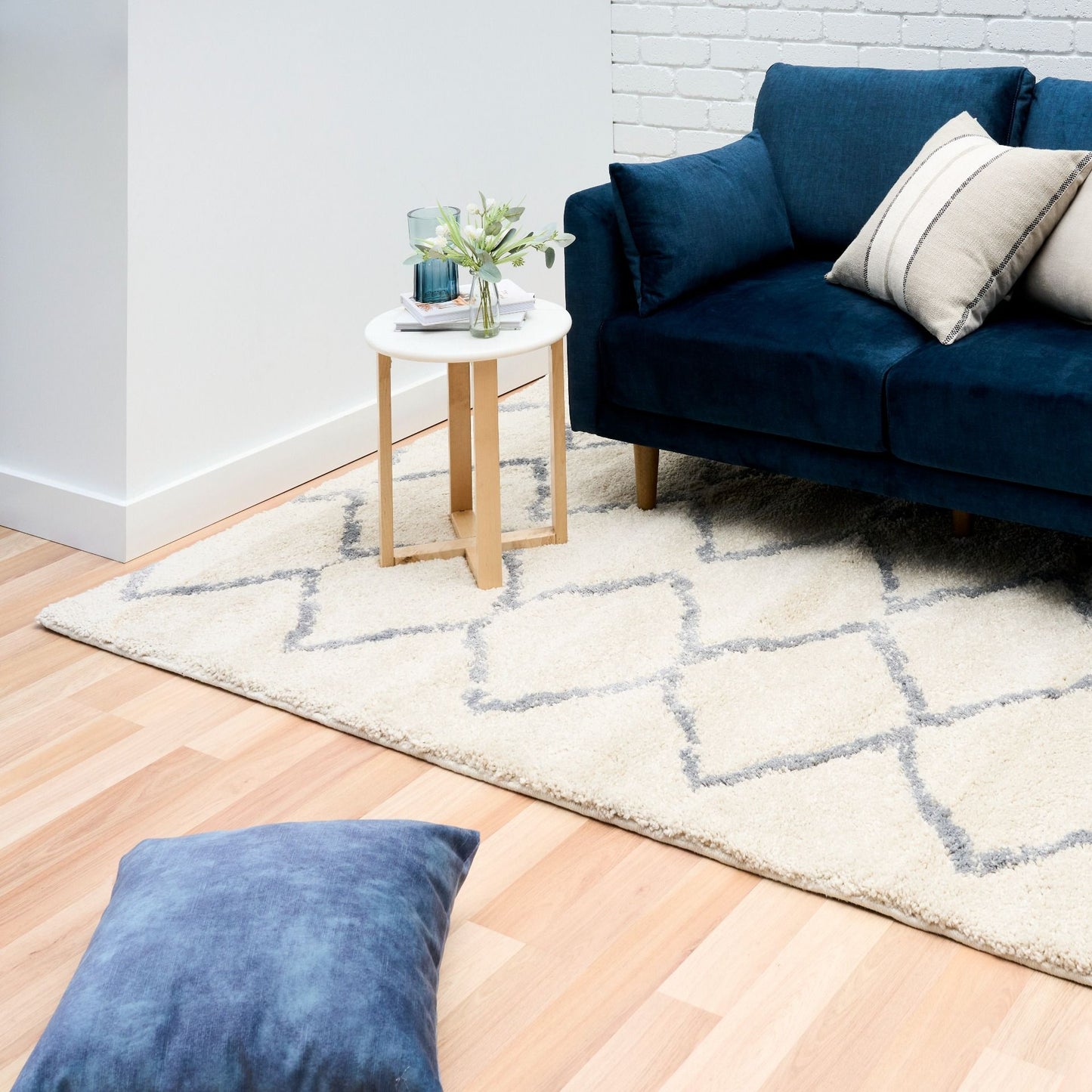 Luana Ivory Grey 701 is a machine made polypropylene rug.  It features a shaggy pile with a moroccan boho inspired design. Colours Ivory with a grey diamond pattern. Sizes 160 X 230, 200 X 290, 240 X 320 and 300 X 390. Styled.