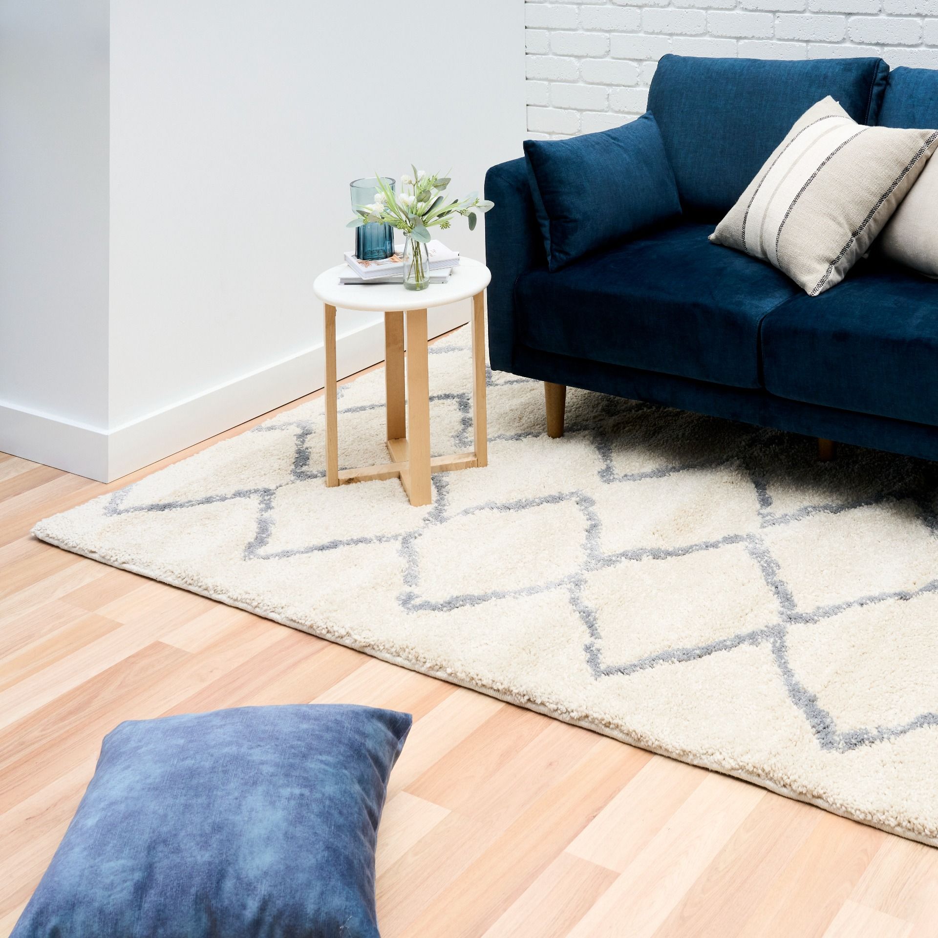 Luana Ivory Grey 701 is a machine made polypropylene rug.  It features a shaggy pile with a moroccan boho inspired design. Colours Ivory with a grey diamond pattern. Sizes 160 X 230, 200 X 290, 240 X 320 and 300 X 390. Styled.