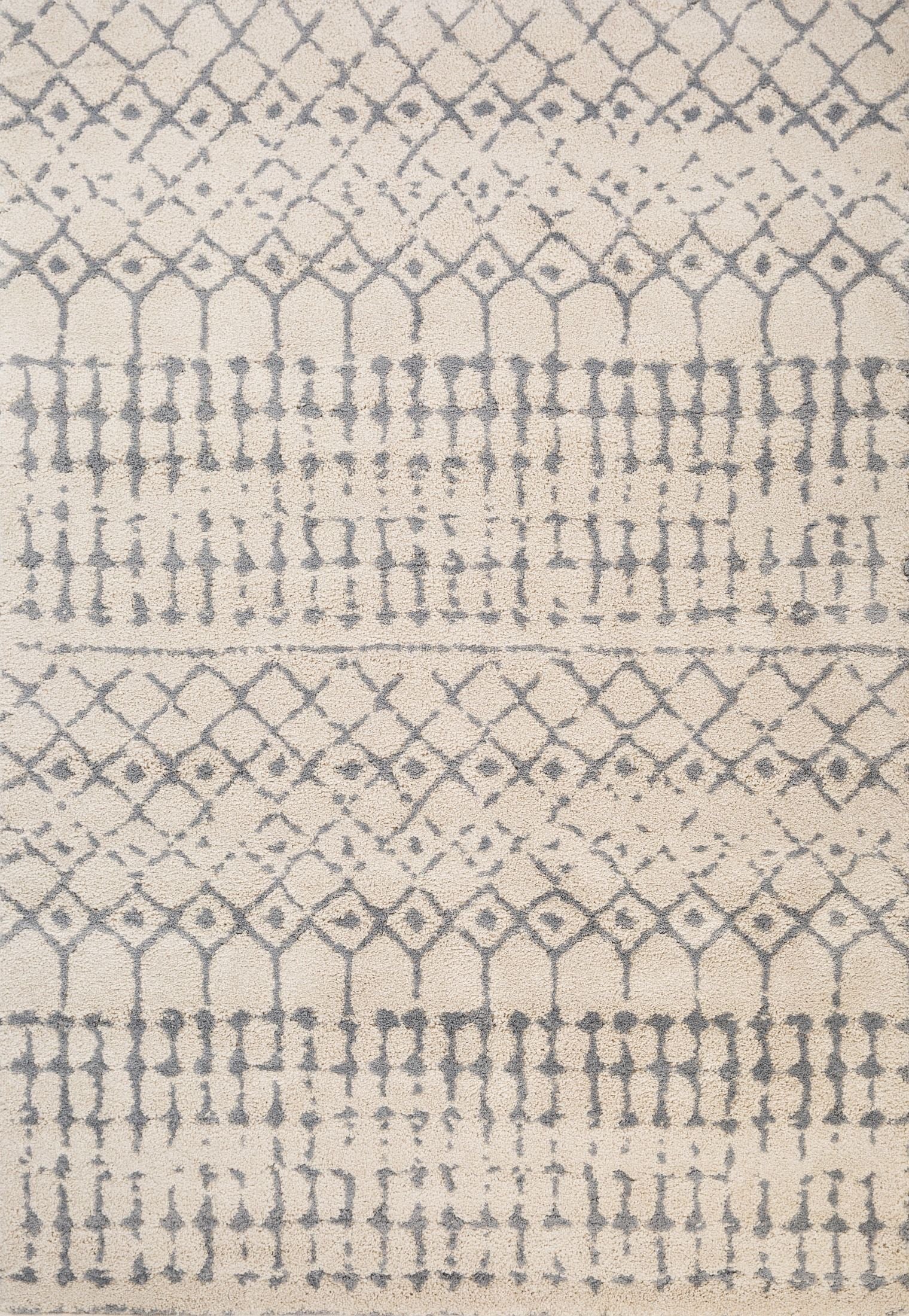 Luana Lattice Ivory Grey is a machine made polypropylene rug.  It features a shaggy pile with a moroccan boho inspired design. Colours Ivory with grey moroccan inspired patterns. Sizes 160 X 230, 200 X 290, 240 X 320 and 300 X 390. Top.