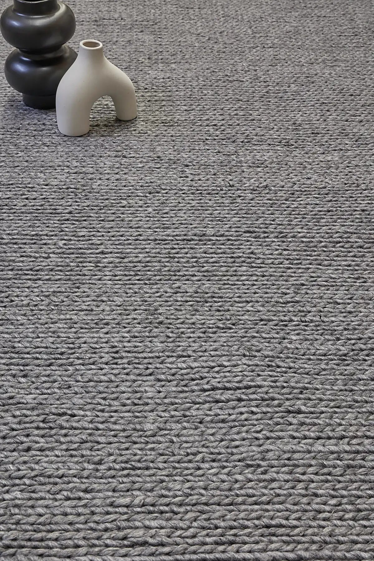 Luxury Smoke is a hand-braided rug crafted using wool and bamboo silk for luxurious feel. Its contemporary Scandinavian design stands out with a modern look and a pile height of 16-18mm. Colour Dark Grey. Sizes 160 X 230, 200 X 290, 240 X 340 and 300 X 400. Life.