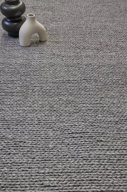 Luxury Smoke is a hand-braided rug crafted using wool and bamboo silk for luxurious feel. Its contemporary Scandinavian design stands out with a modern look and a pile height of 16-18mm. Colour Dark Grey. Sizes 160 X 230, 200 X 290, 240 X 340 and 300 X 400. Life.