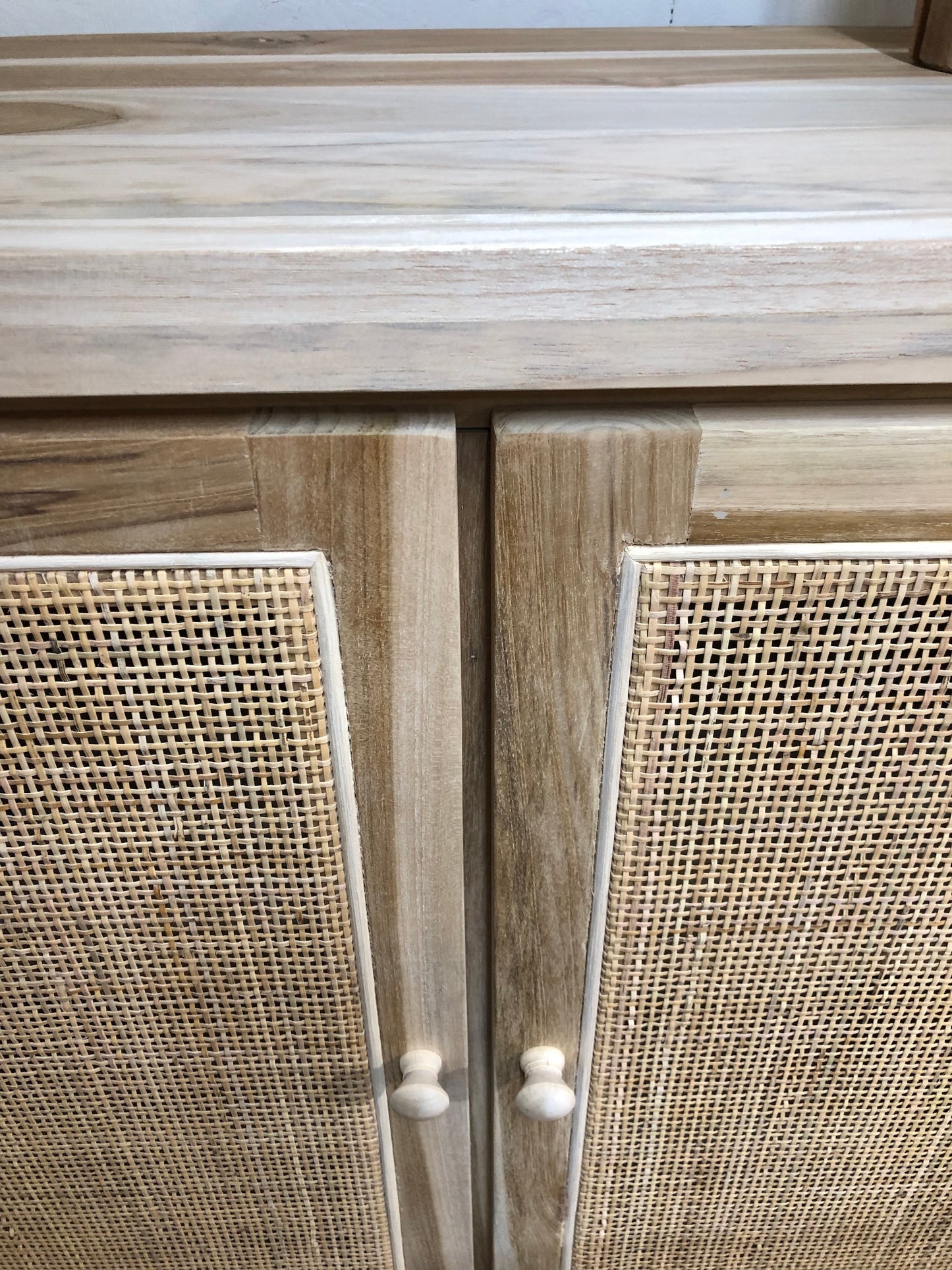 The Manzanita 4 Door Buffet is a contemporary and coastal four-door sideboard crafted from sustainable teak. The sideboard features open mesh rattan doors. Colour natural. Measures 1500 length X 400 depth X 950 height. Front Doors.