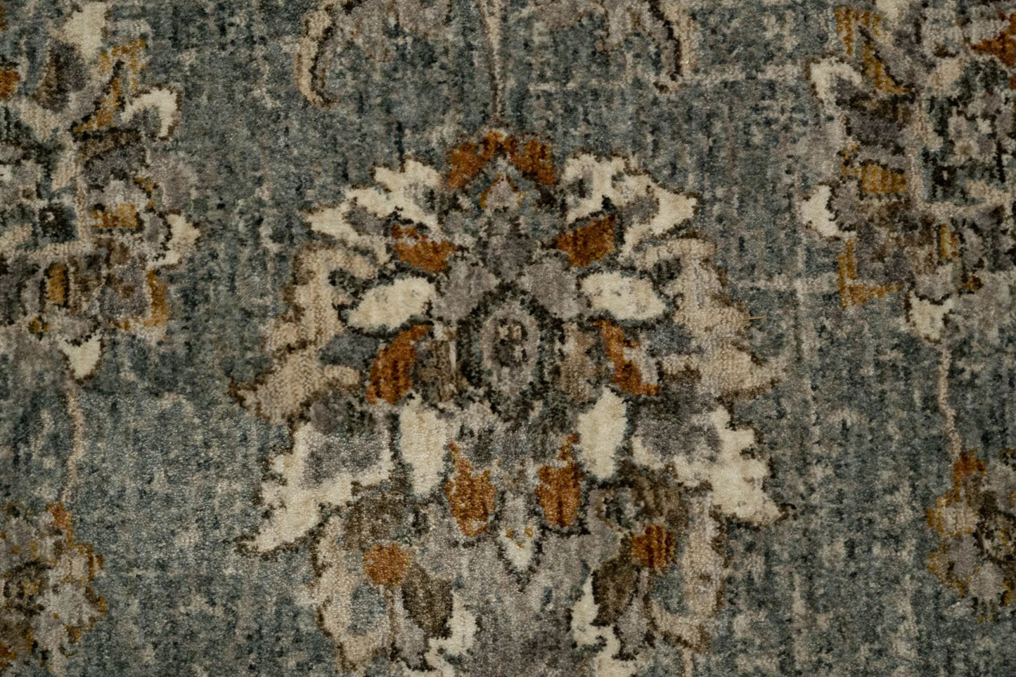 The Matana Dusk 1330 Rug. Traditional style, machine made rug. Colours grey, light grey, beige and cream. Sizes 160 X 235, 200 X 285, 240 X 330 and 300 X 400. Close.