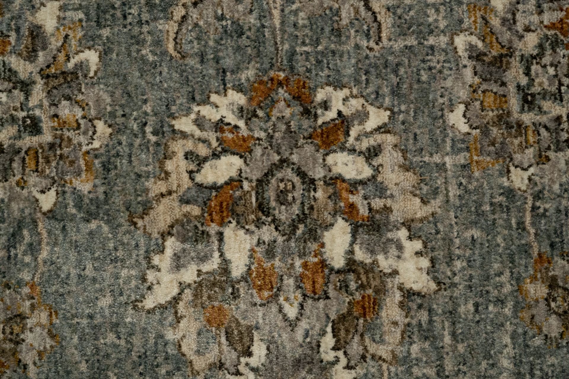 The Matana Dusk 1330 Rug. Traditional style, machine made rug. Colours grey, light grey, beige and cream. Sizes 160 X 235, 200 X 285, 240 X 330 and 300 X 400. Close.