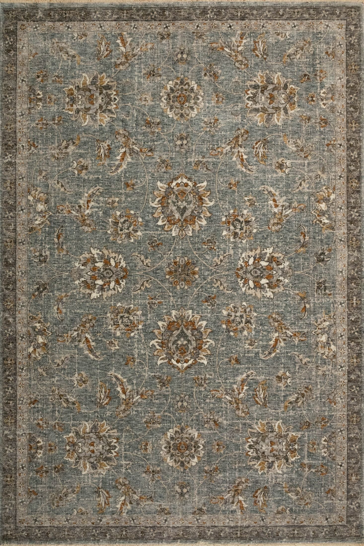 The Matana Dusk 1330 Rug. Traditional style, machine made rug. Colours grey, light grey, beige and cream. Sizes 160 X 235, 200 X 285, 240 X 330 and 300 X 400. Top.
