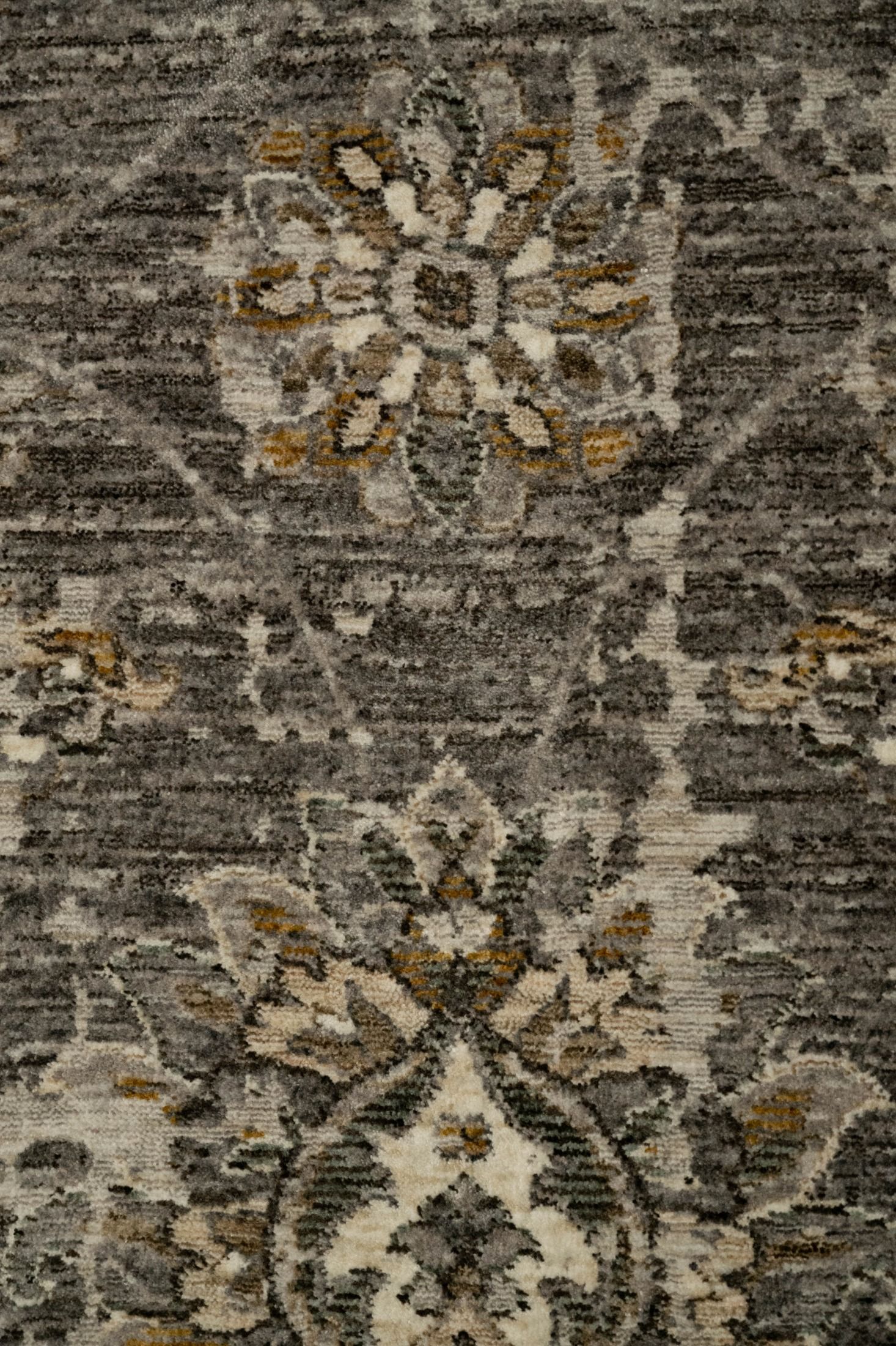 The Matana Grey 1330 Rug. Traditional style, machine made rug. Colours grey, dark grey, beiges and creams. Sizes 160 X 235, 200 X 285, 240 X 330 and 300 X 400. Close.