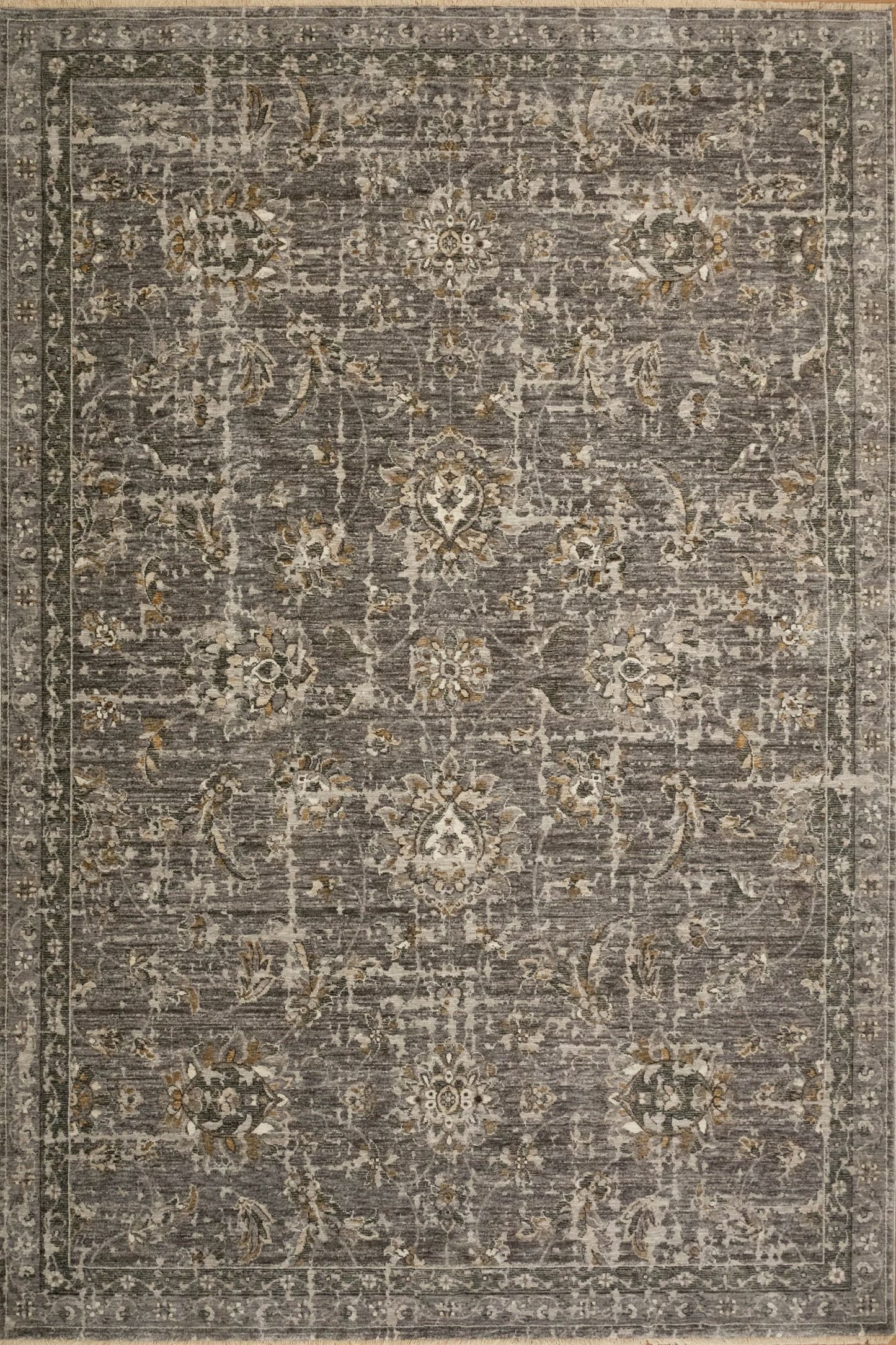 The Matana Grey 1330 Rug. Traditional style, machine made rug. Colours grey, dark grey, beiges and creams. Sizes 160 X 235, 200 X 285, 240 X 330 and 300 X 400. Top.