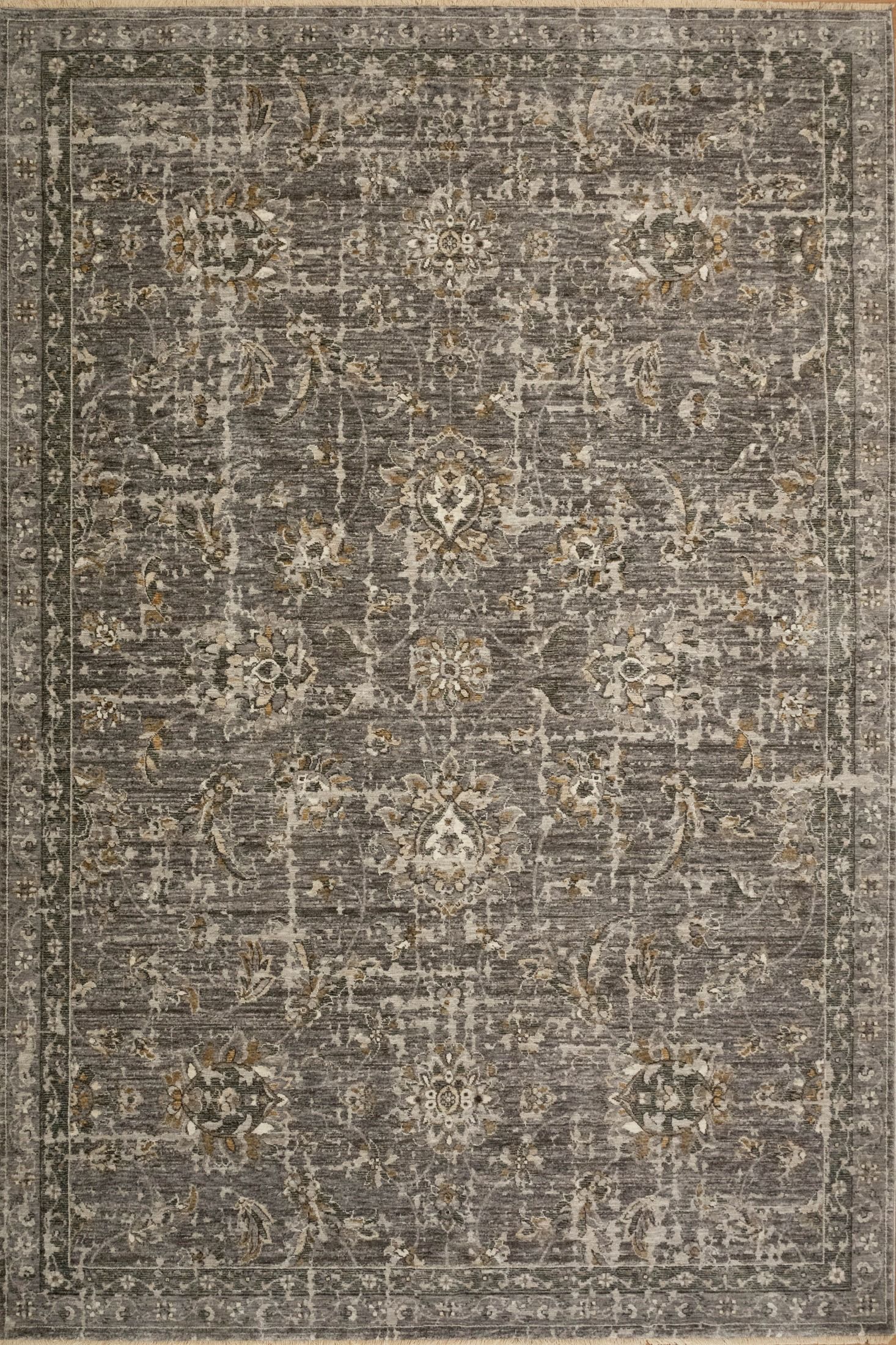 The Matana Grey 1330 Rug. Traditional style, machine made rug. Colours grey, dark grey, beiges and creams. Sizes 160 X 235, 200 X 285, 240 X 330 and 300 X 400. Top.