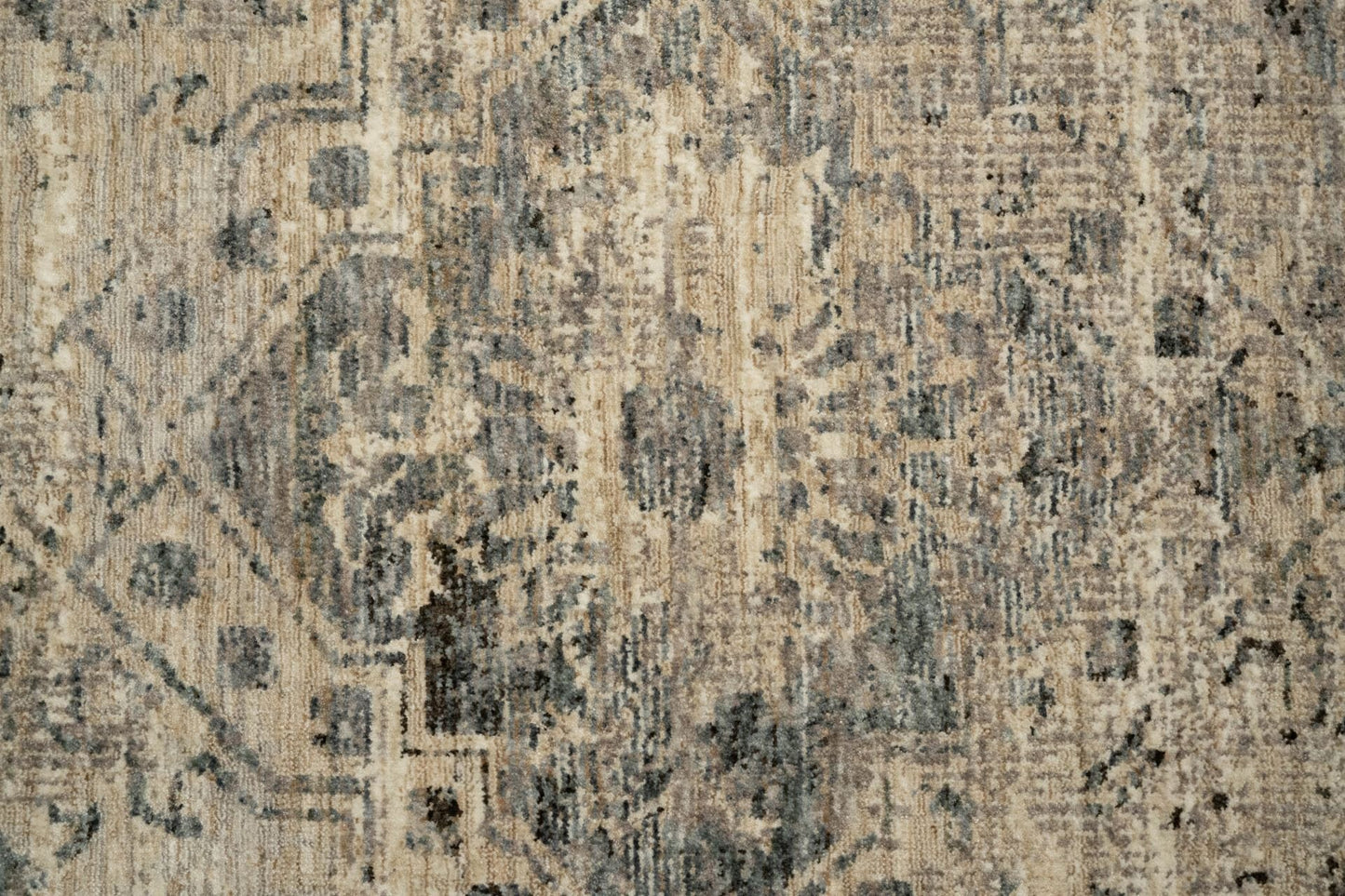 The Matana Grey 4154 Rug. Traditional style, machine made rug. Colours grey, light grey's and blue grey's. Sizes 160 X 235, 200 X 285, 240 X 330 and 300 X 400. Close.