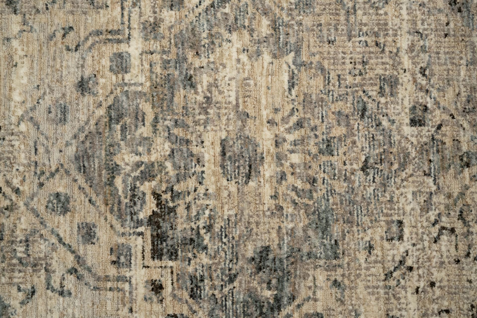 The Matana Grey 4154 Rug. Traditional style, machine made rug. Colours grey, light grey's and blue grey's. Sizes 160 X 235, 200 X 285, 240 X 330 and 300 X 400. Close.
