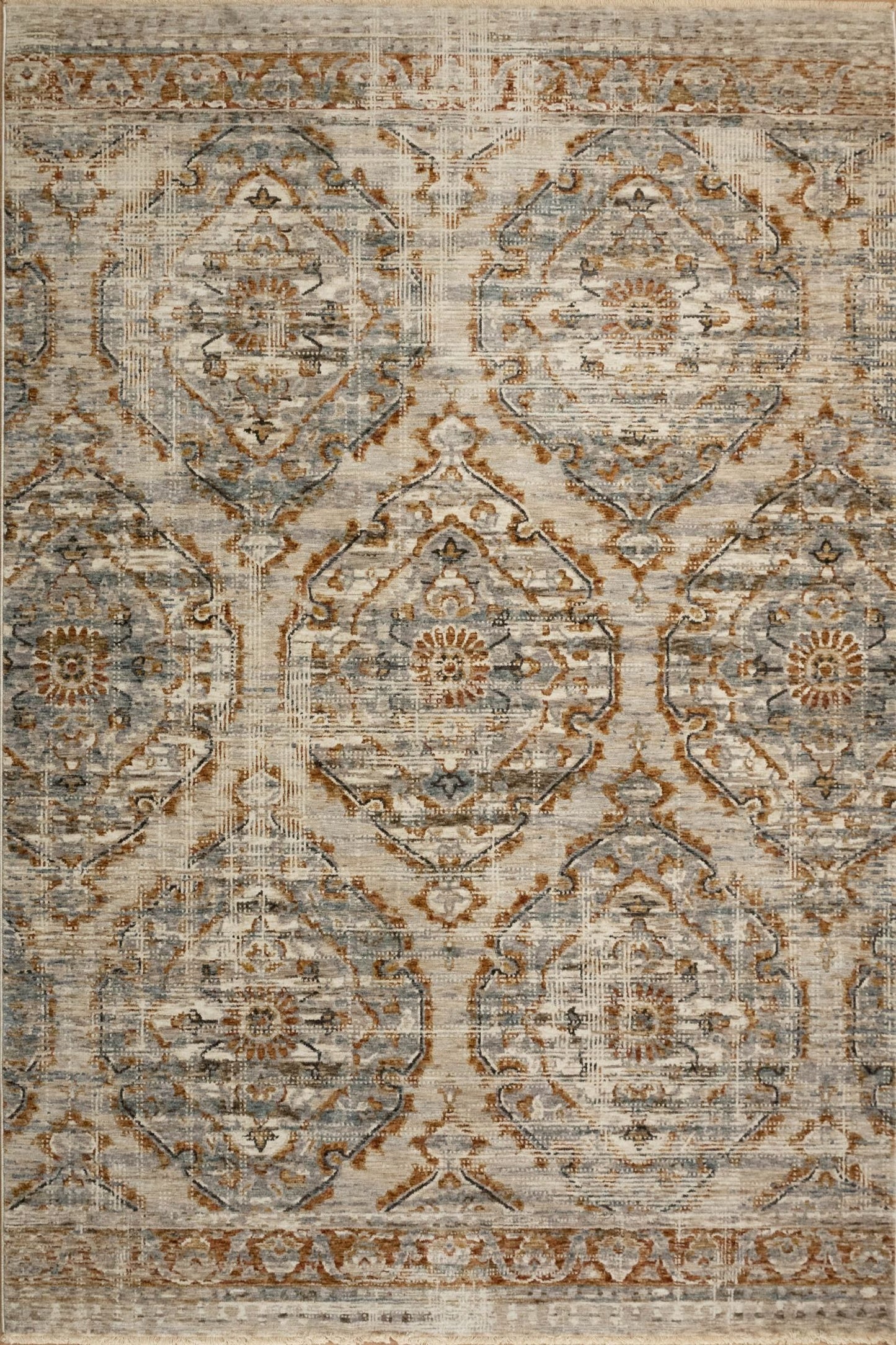 The Matana Multi 7 Rug. Traditional style, machine made rug. Colours light grey, grey, brown and beige. Sizes 160 X 235, 200 X 285, 240 X 330 and 300 X 400. Top.
