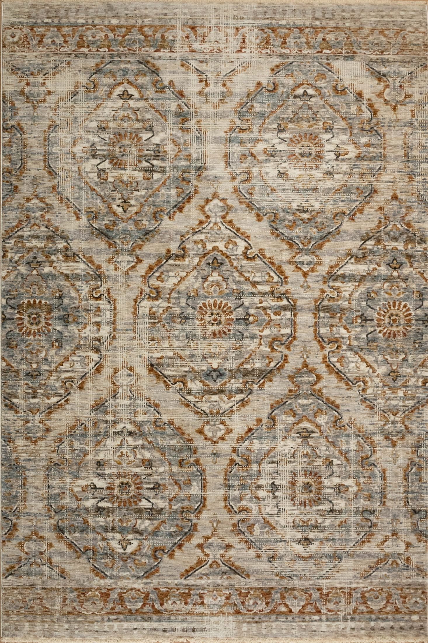 The Matana Multi 7 Rug. Traditional style, machine made rug. Colours light grey, grey, brown and beige. Sizes 160 X 235, 200 X 285, 240 X 330 and 300 X 400. Top.